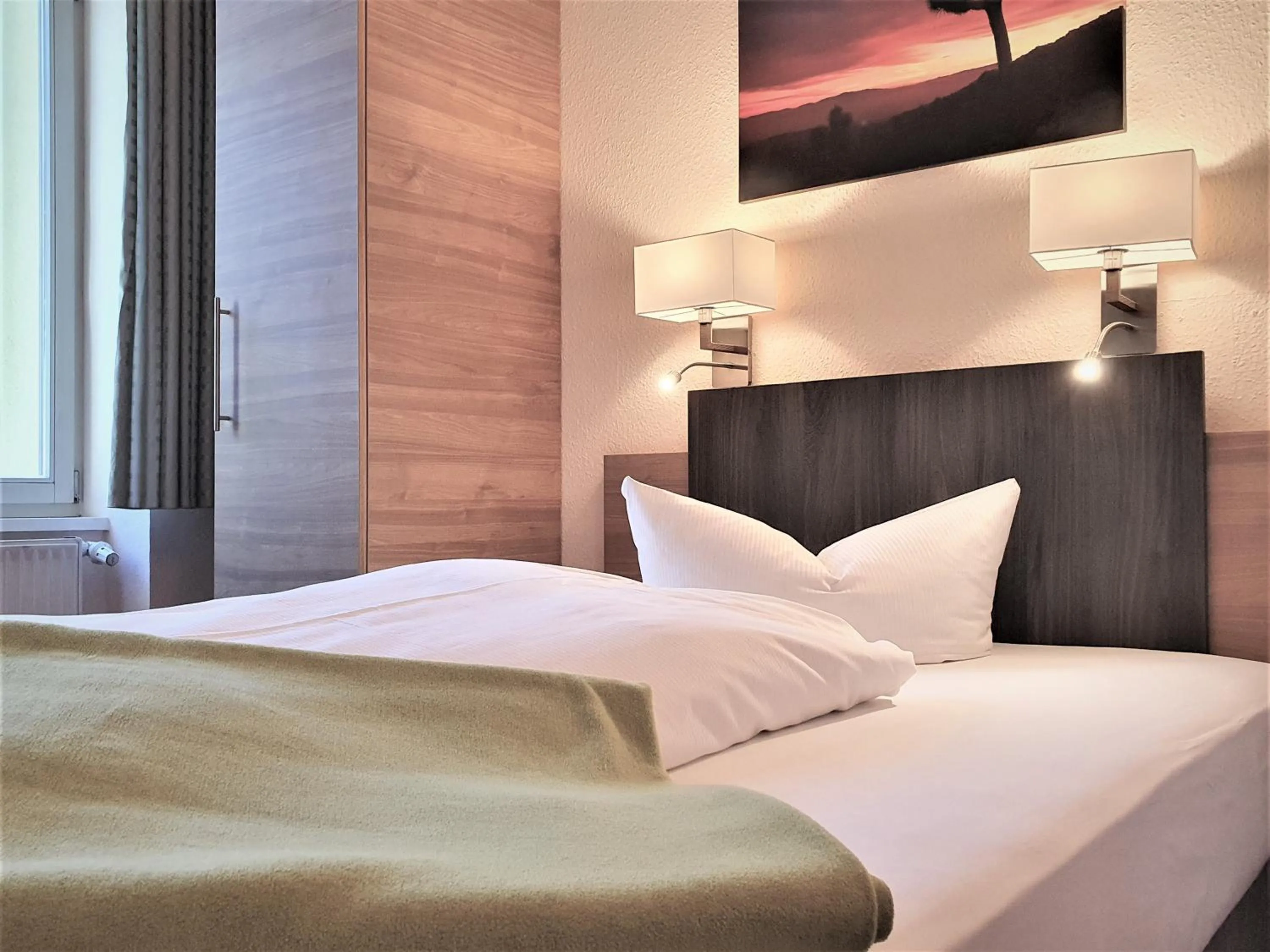 Bed in Melarose Feng Shui Hotel