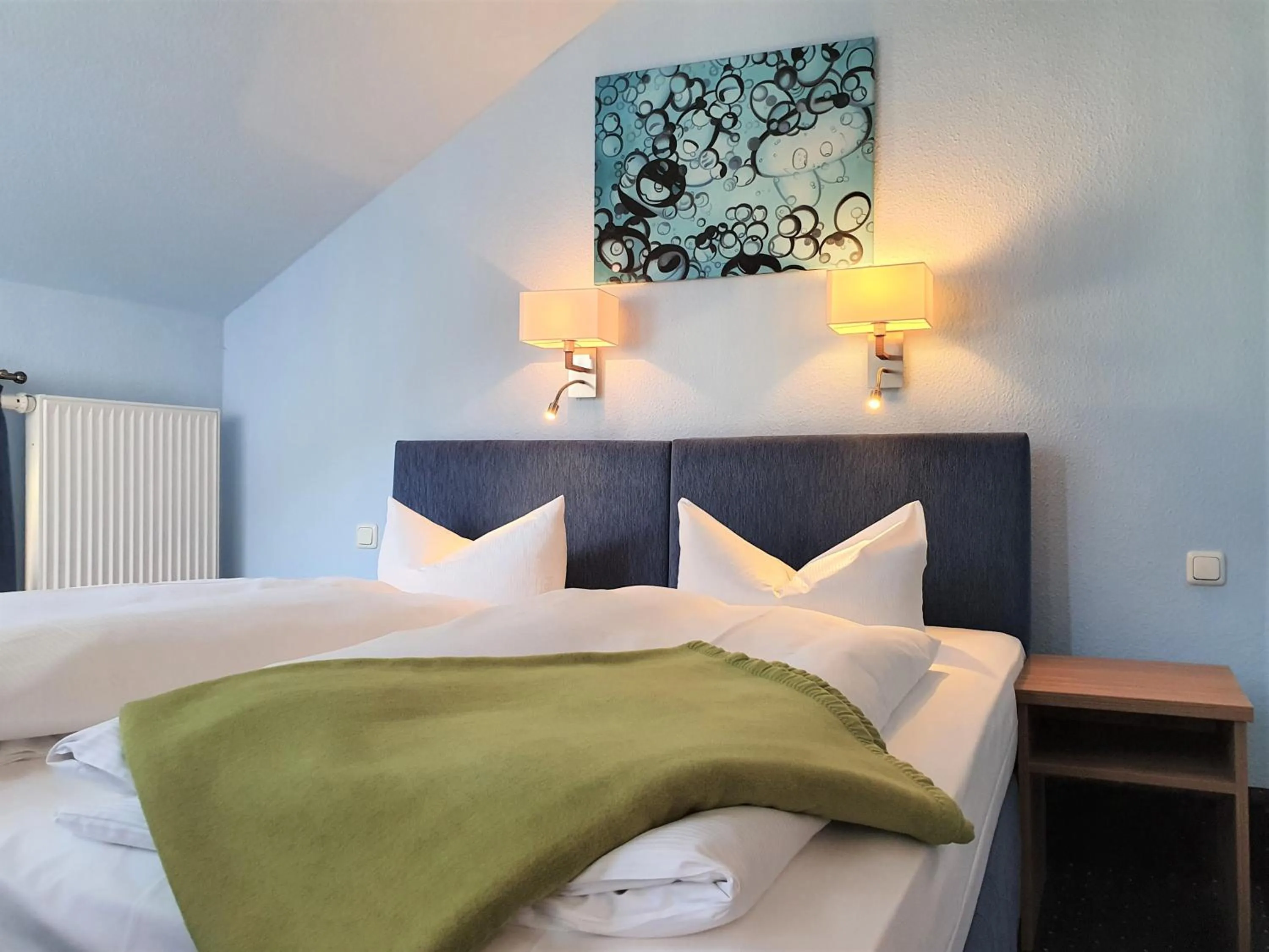 Bed in Melarose Feng Shui Hotel