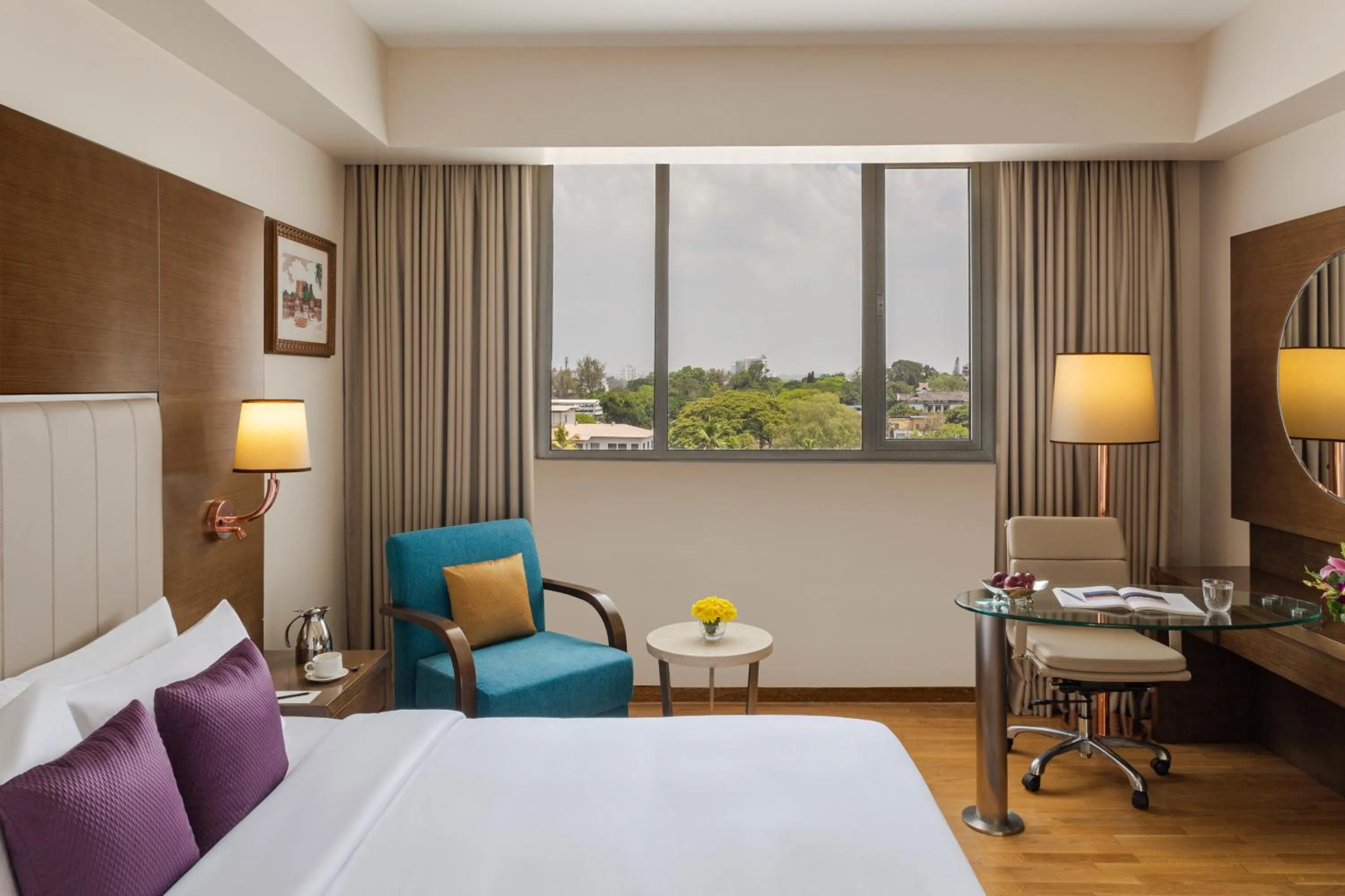 Photo of the whole room, Bed in Vivanta Thiruvananthapuram