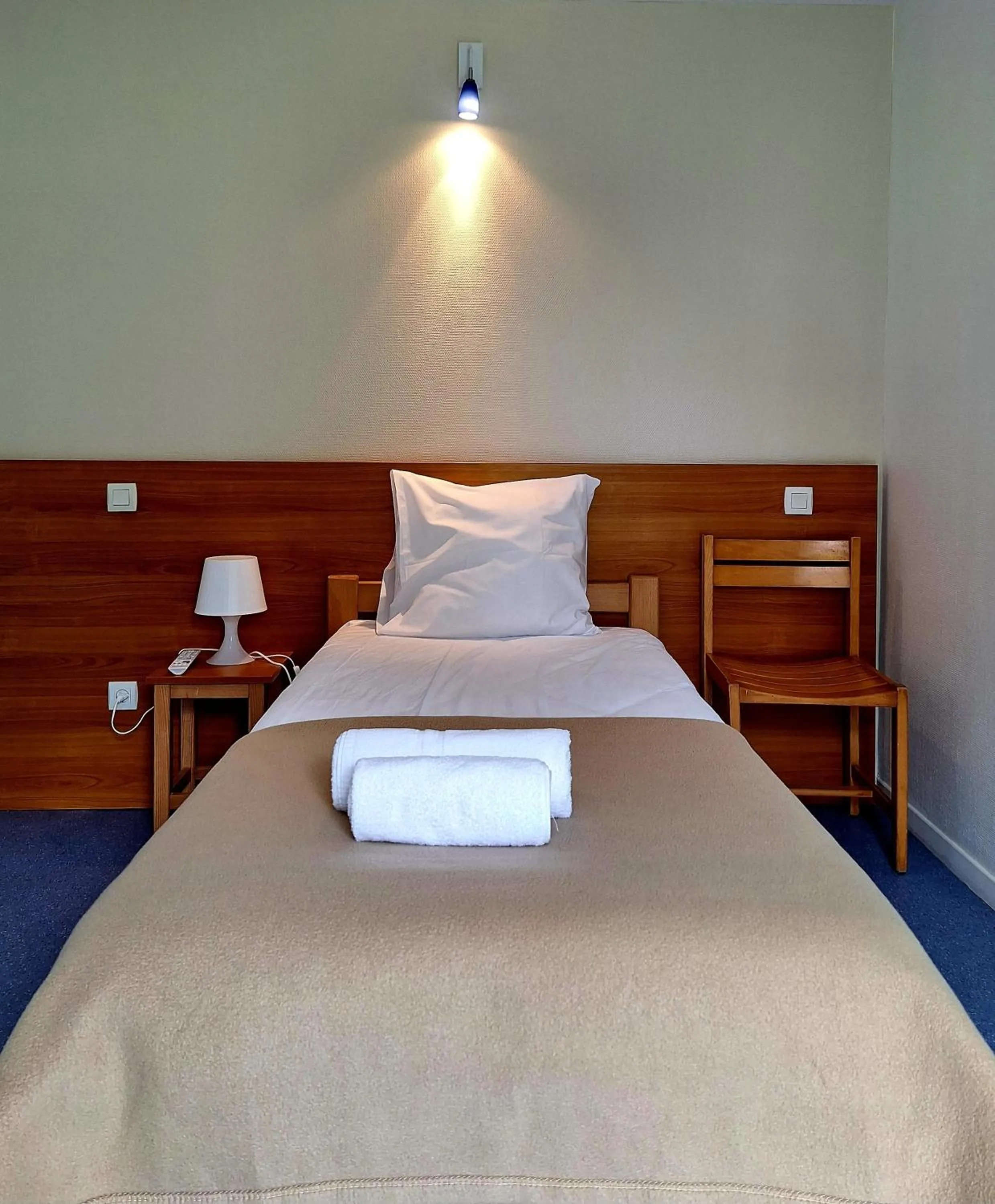 Bed in Hôtel Eden Lake