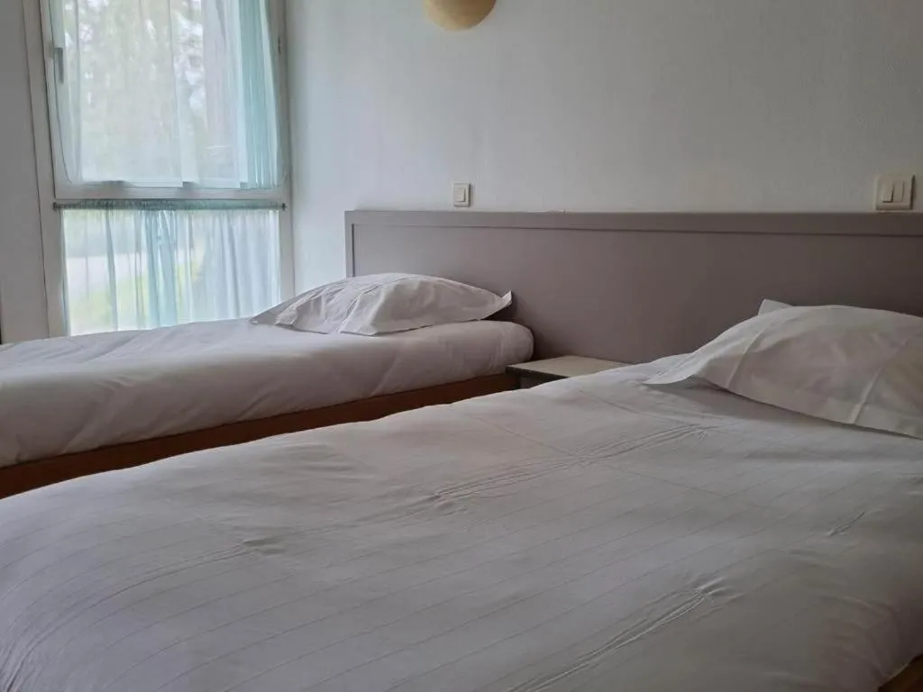 Bed in Hôtel Eden Lake