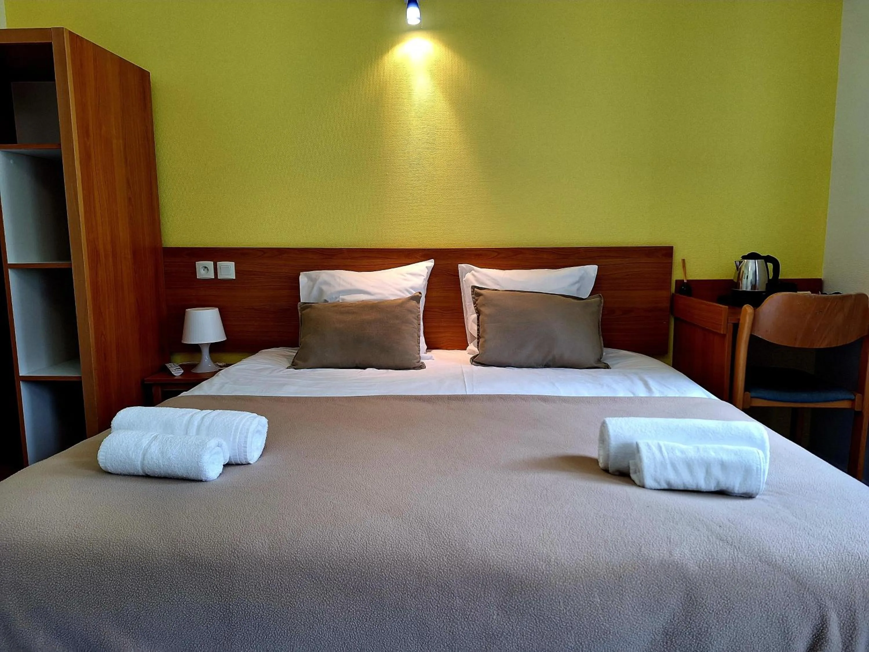 Bed in Hôtel Eden Lake