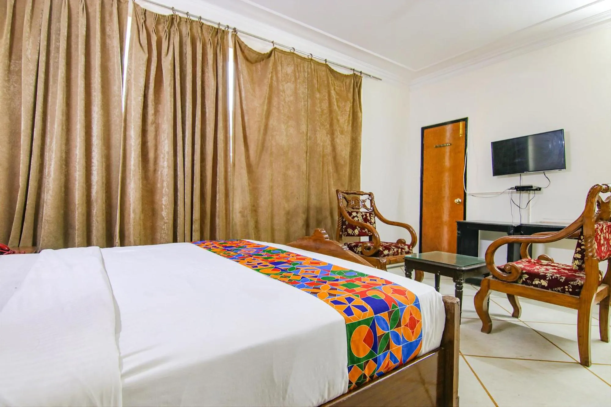 Bed in FabHotel Singh Suite - DLF Phase 3, Gurugram