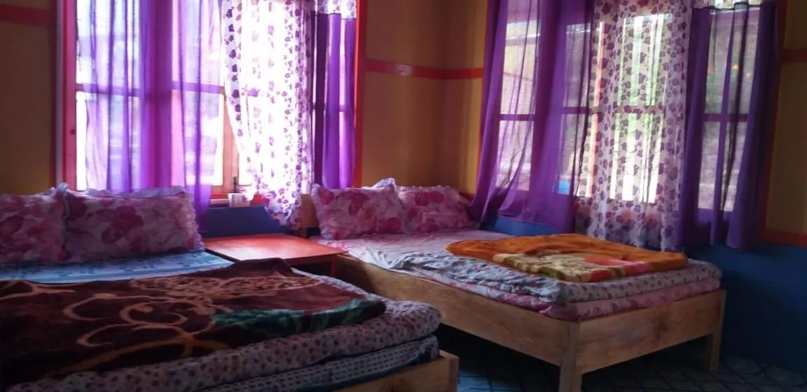 Bed in Niru Homestay