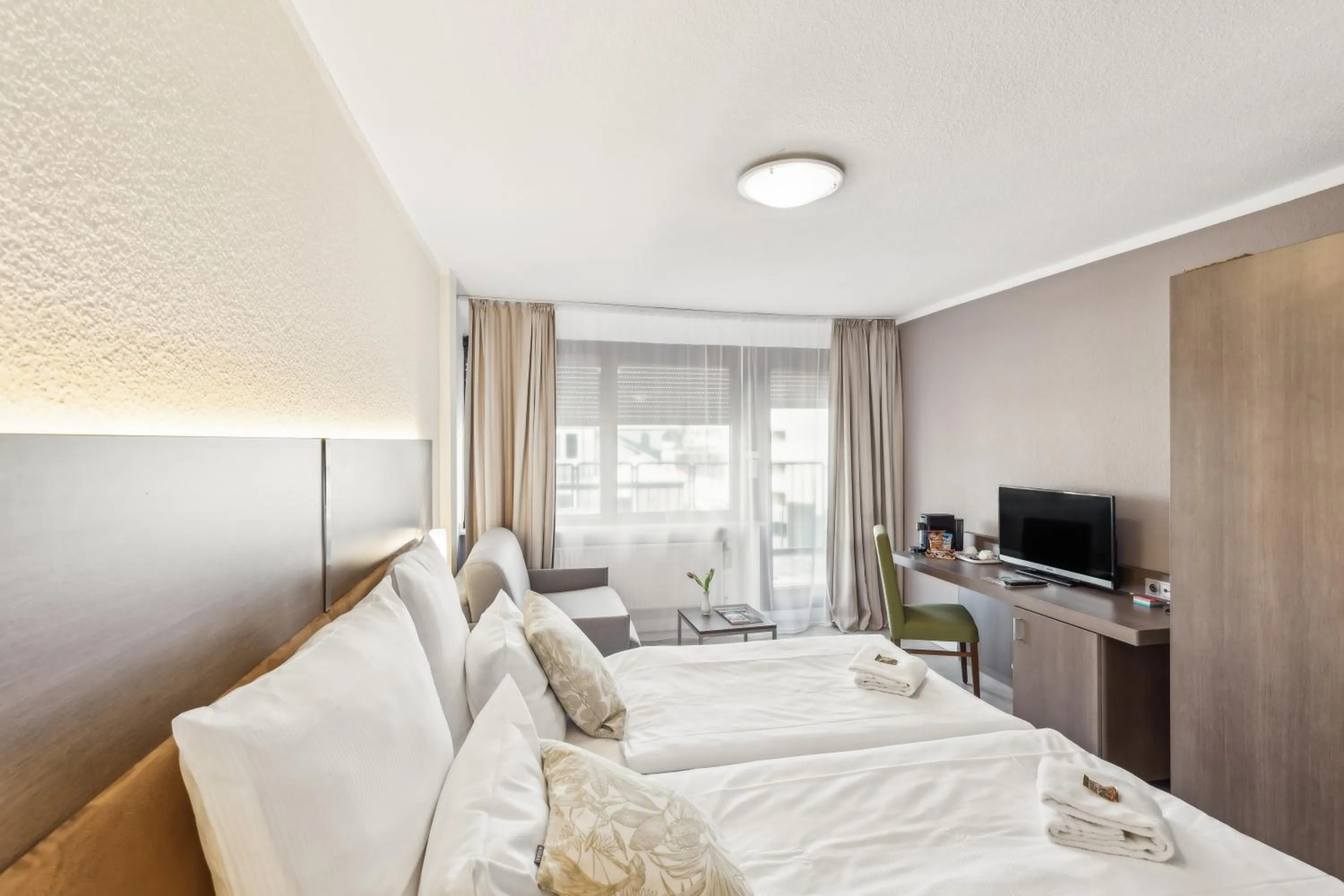 Bed in Cityhotel Amadeus