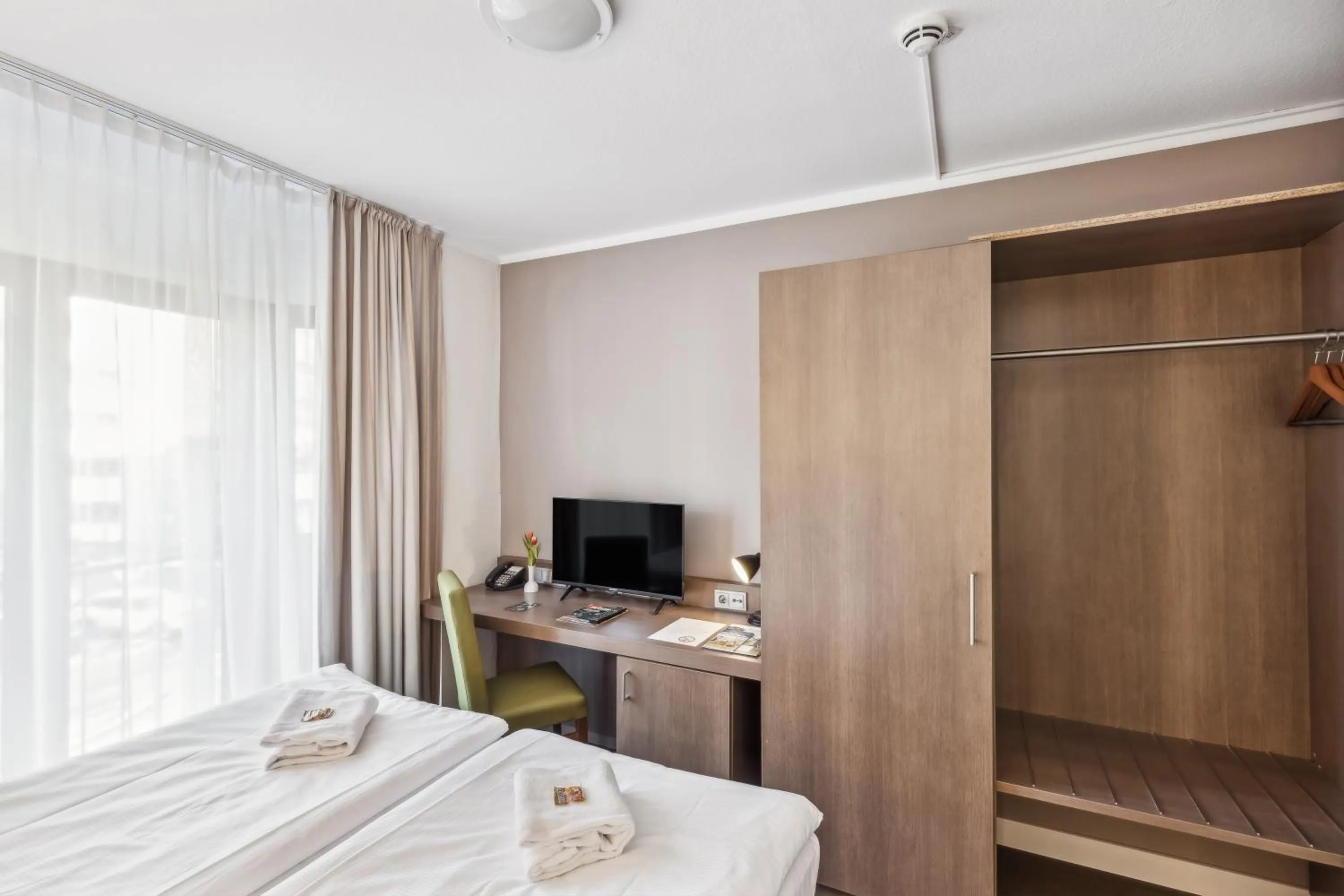 Bed in Cityhotel Amadeus