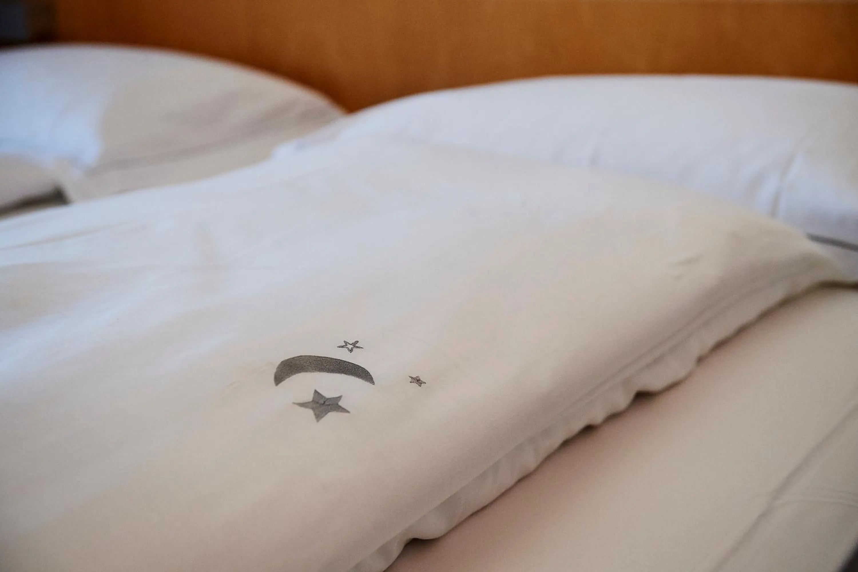 Bed in Hôtel Le Funi de Cossonay