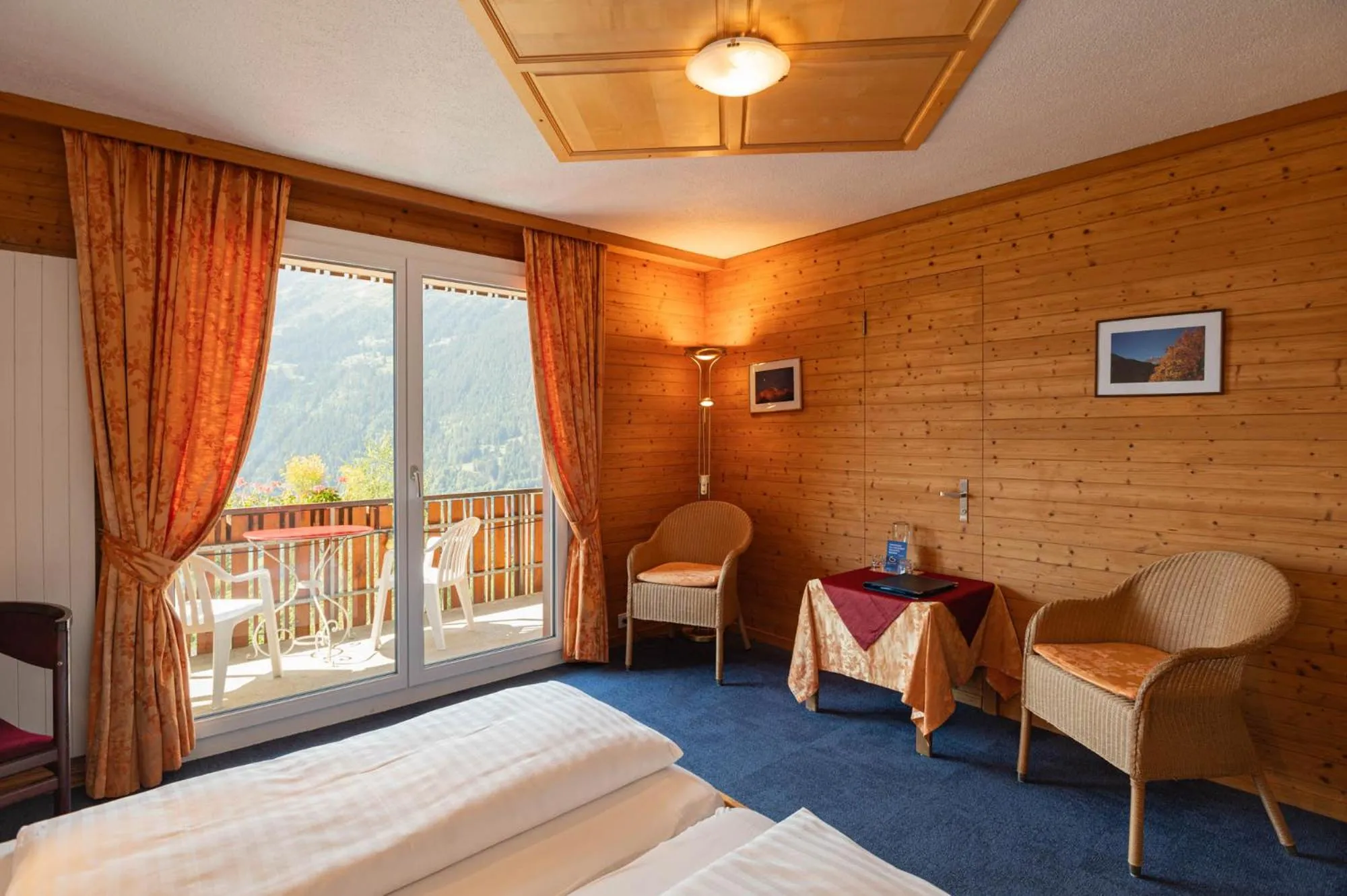 Bed in Hotel Bellevue - Traditional Swiss Hideaway