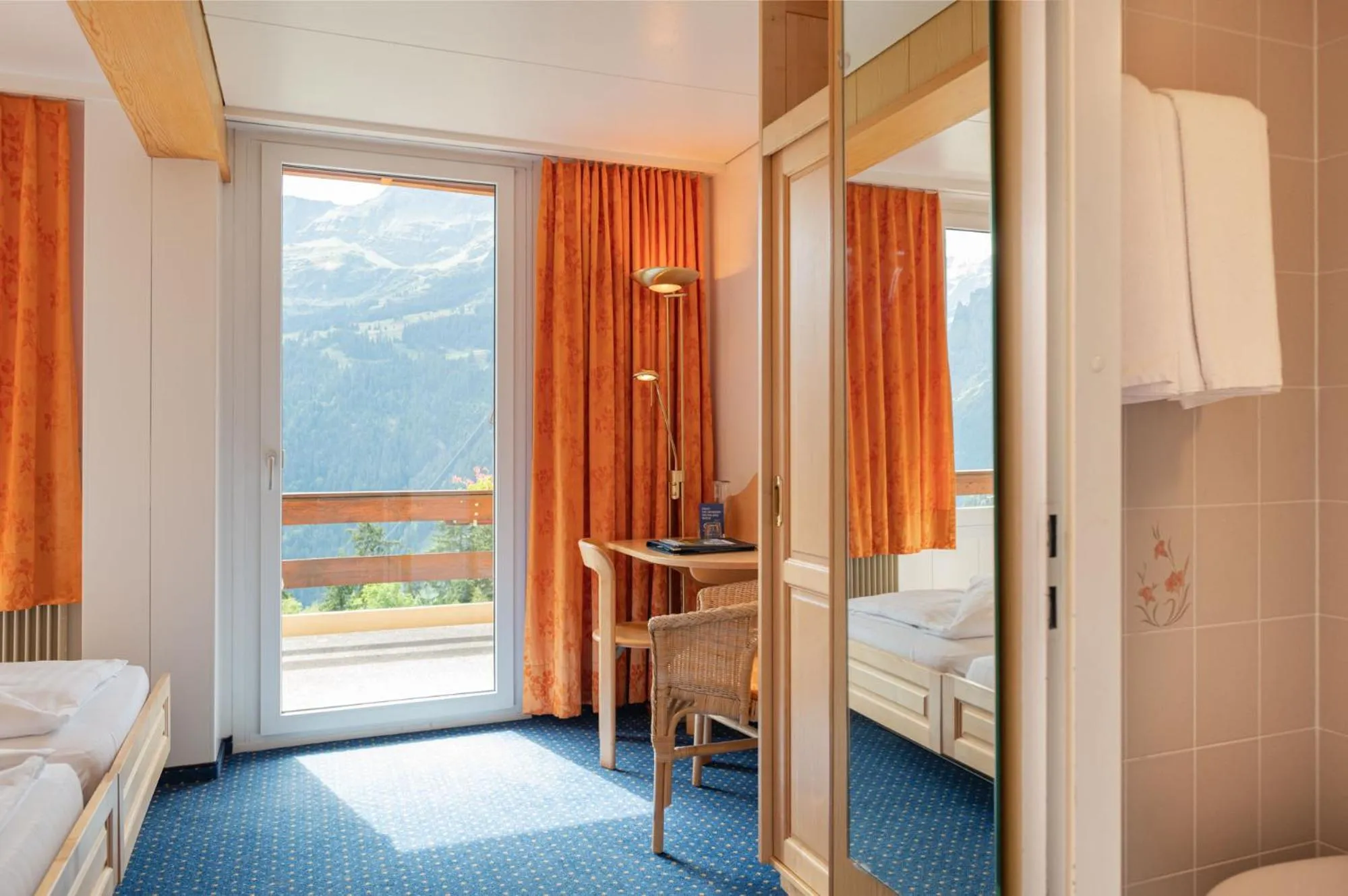 Bed in Hotel Bellevue - Traditional Swiss Hideaway