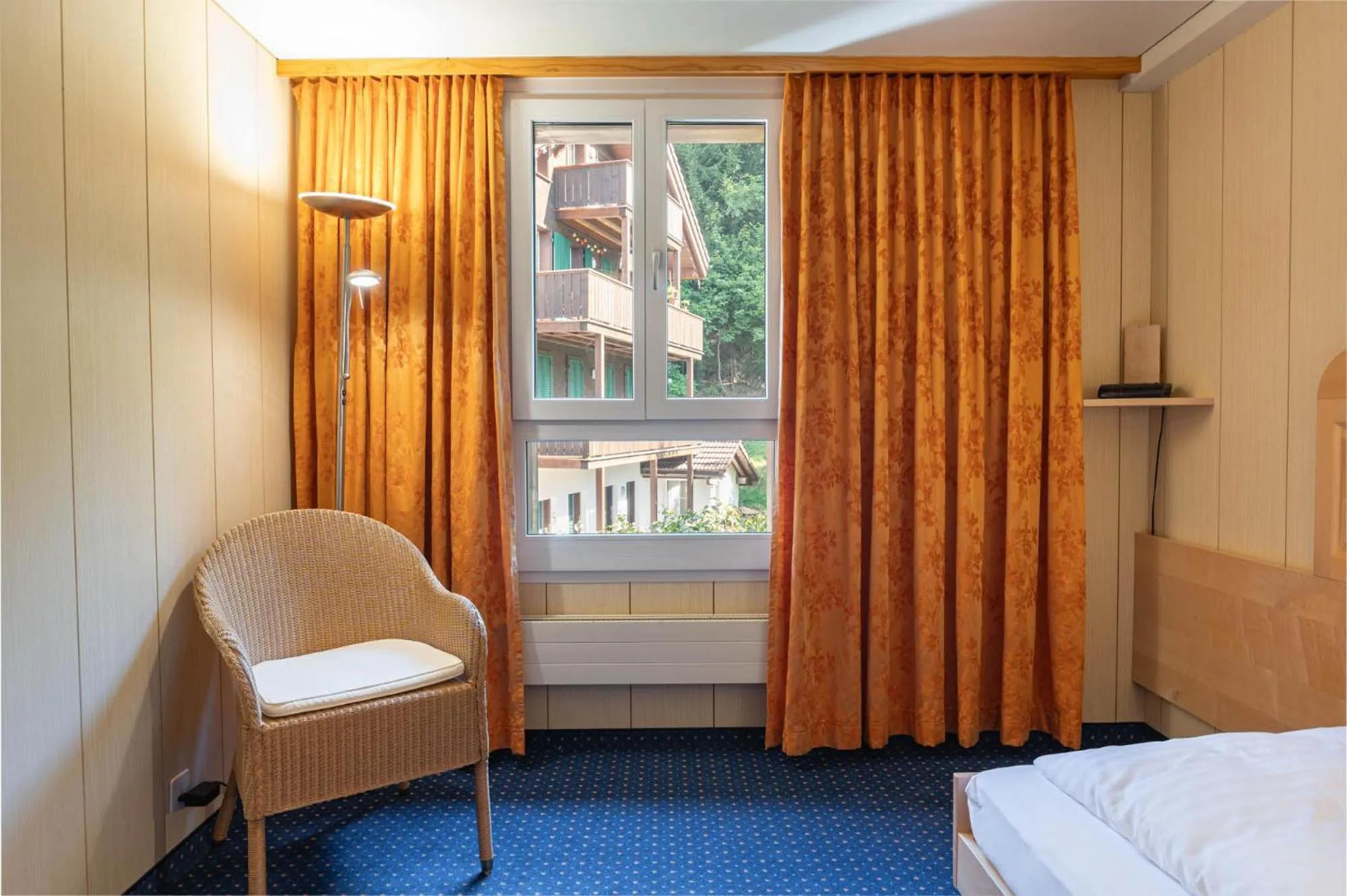 Bed in Hotel Bellevue - Traditional Swiss Hideaway