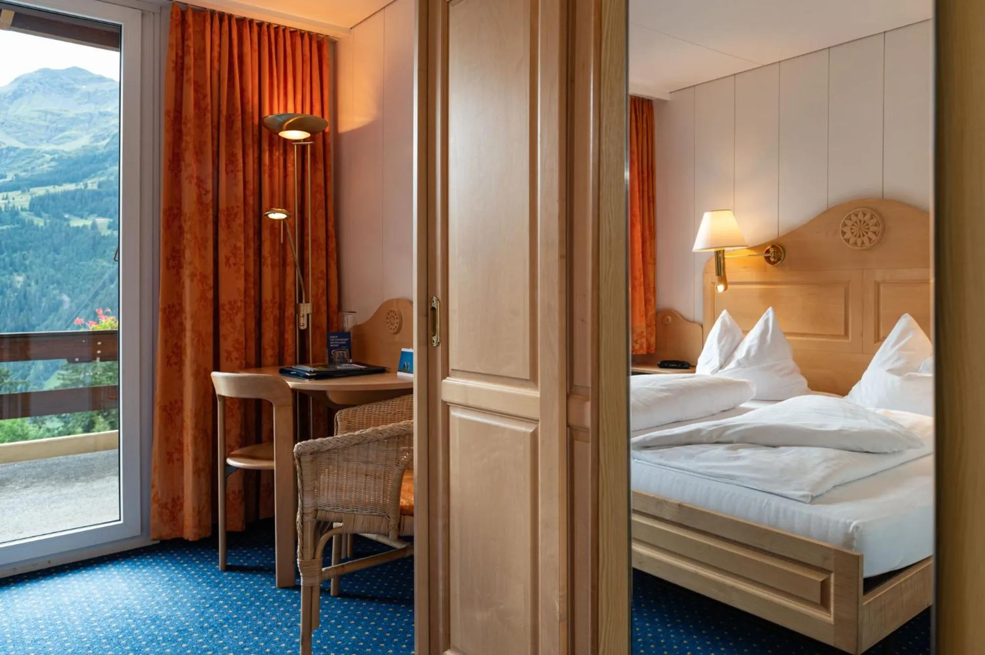 Bed in Hotel Bellevue - Traditional Swiss Hideaway