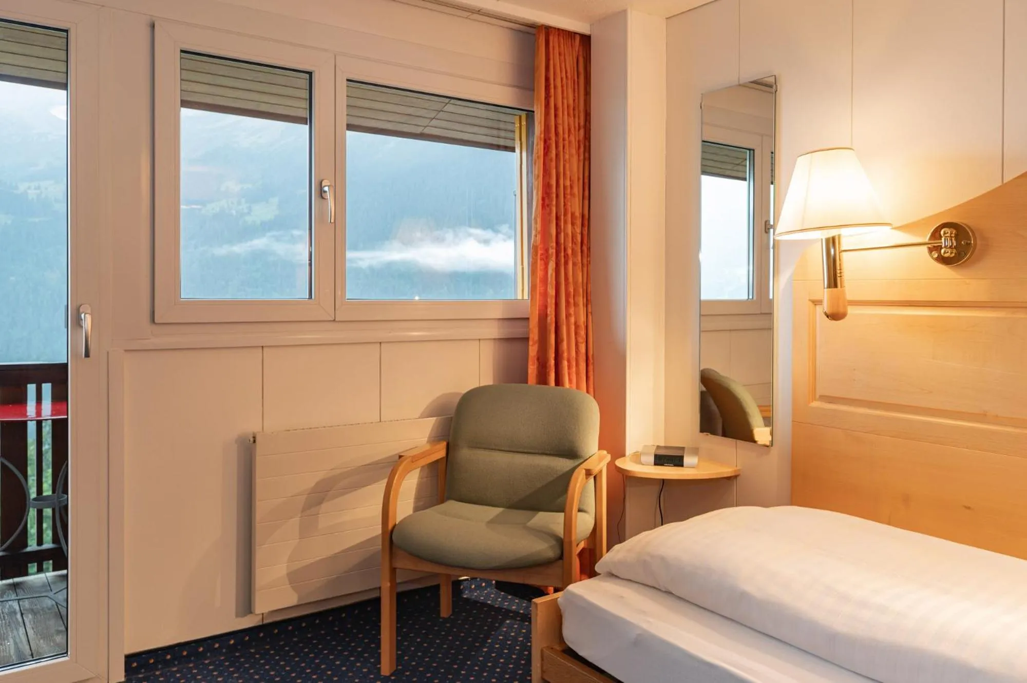 Bed in Hotel Bellevue - Traditional Swiss Hideaway