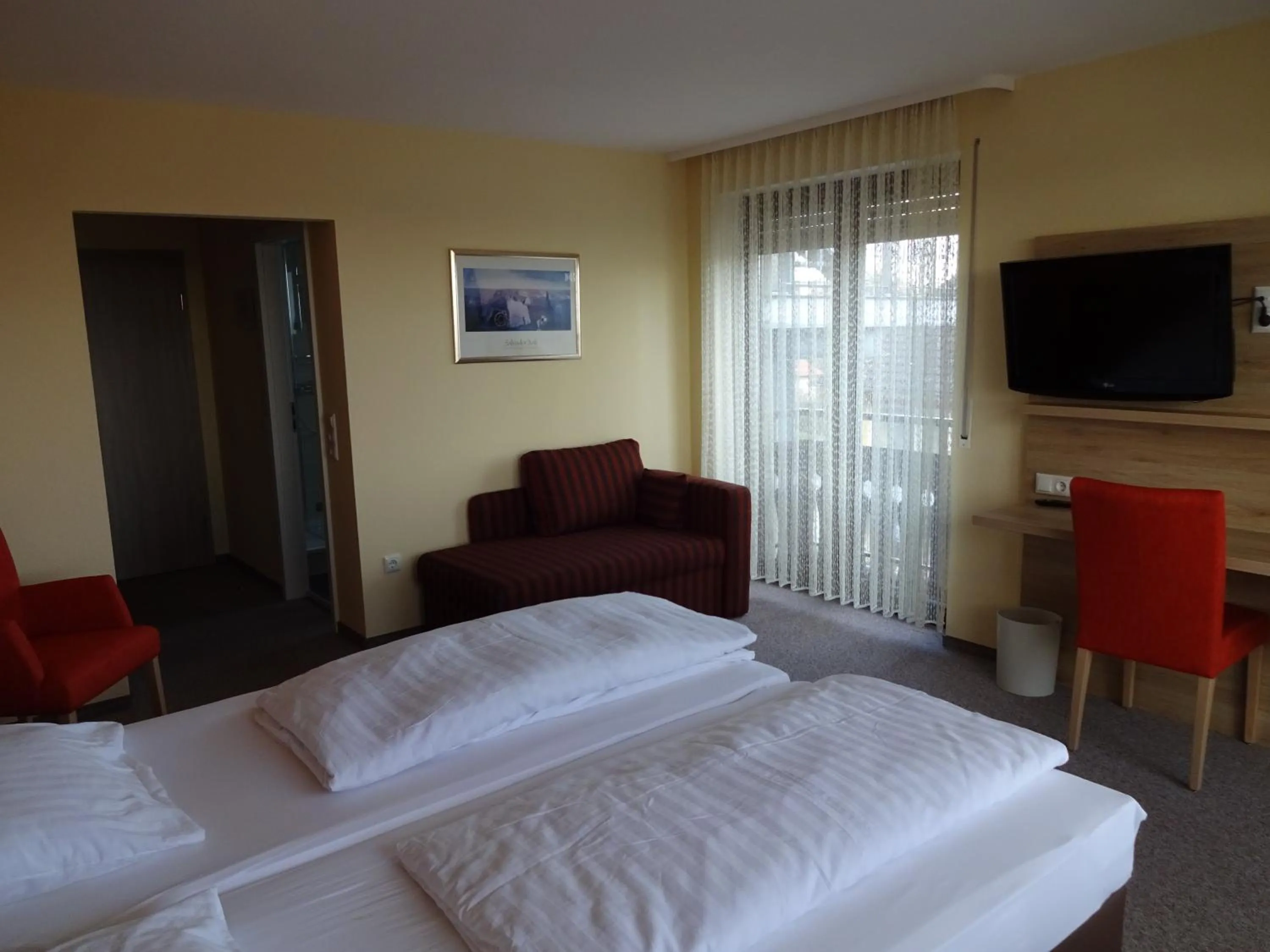 Photo of the whole room, Bed in Gasthof Hotel Zum Ross