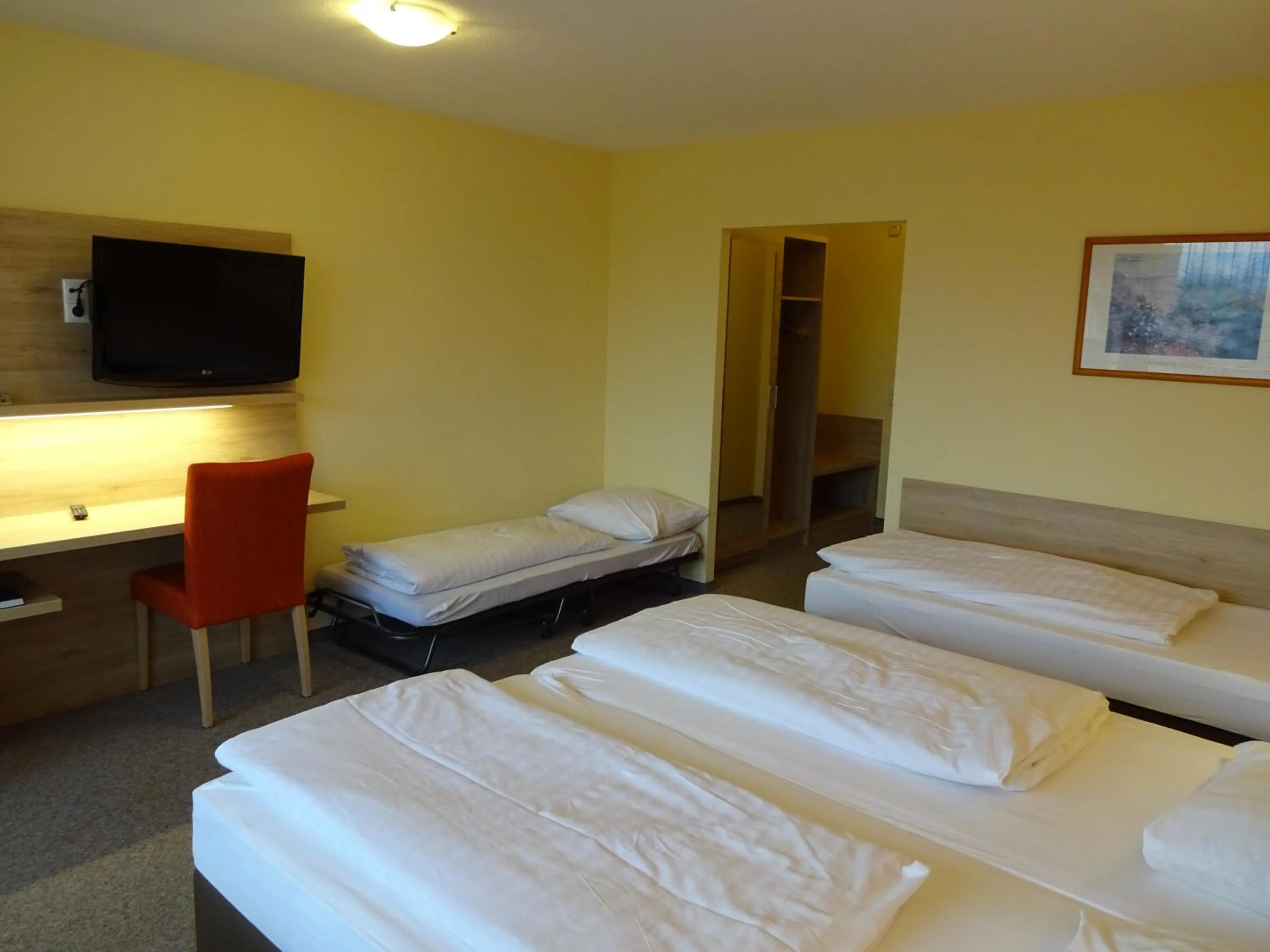 Photo of the whole room, Bed in Gasthof Hotel Zum Ross