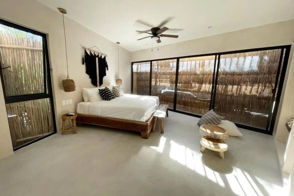 Bed in Tulum Apartment Boho Vibes