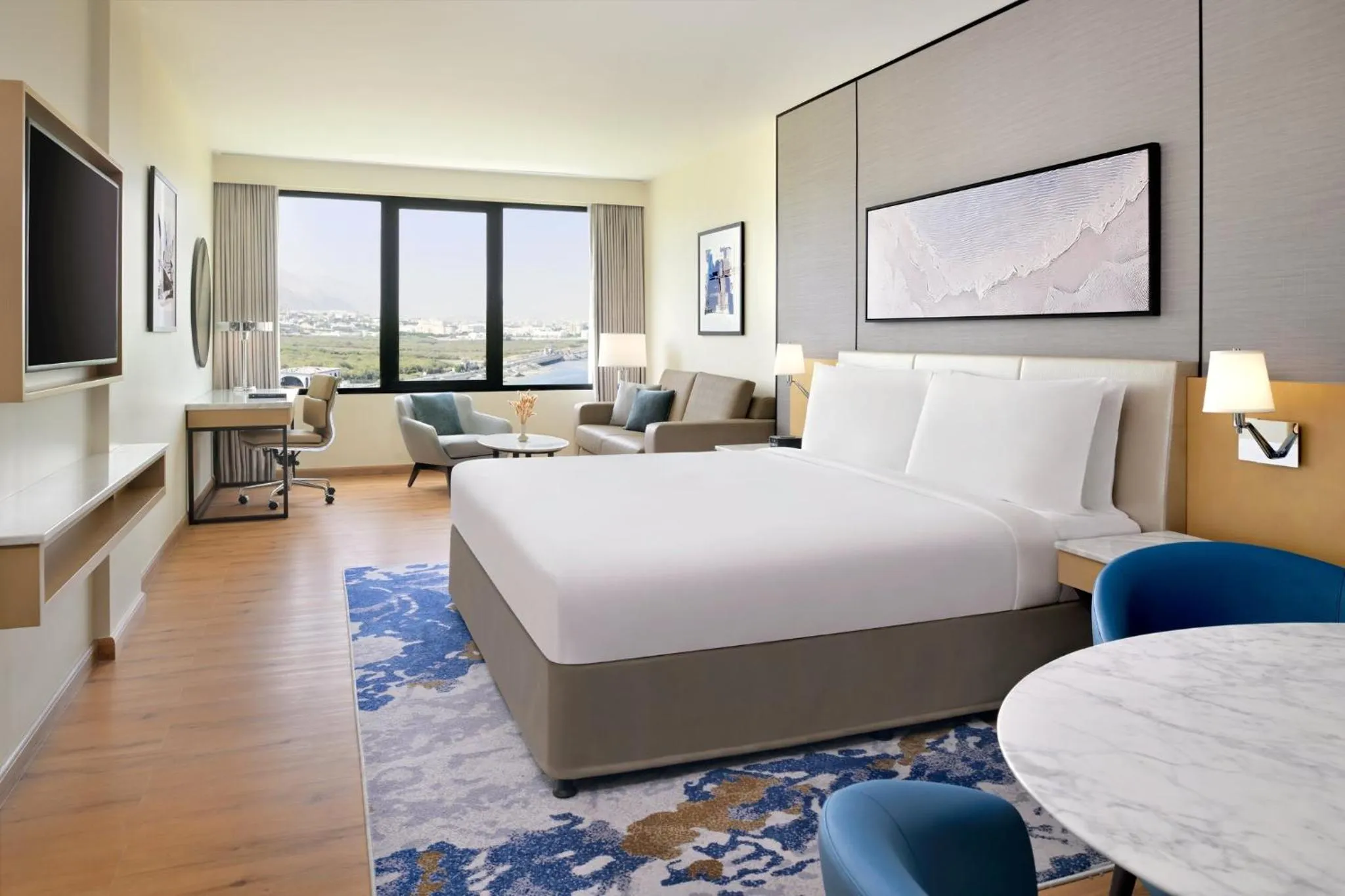 Photo of the whole room, Bed in Crowne Plaza Muscat by IHG