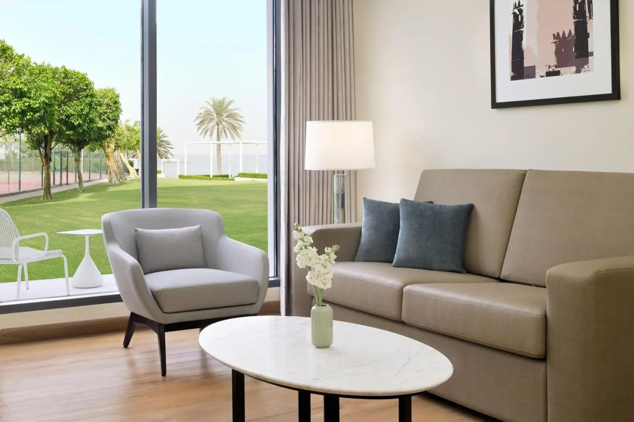 Family Room Sofa Bed Courtyard Access in Crowne Plaza Muscat by IHG Family Room Sofa Bed Courtyard Access in Crowne Plaza Muscat by IHG
