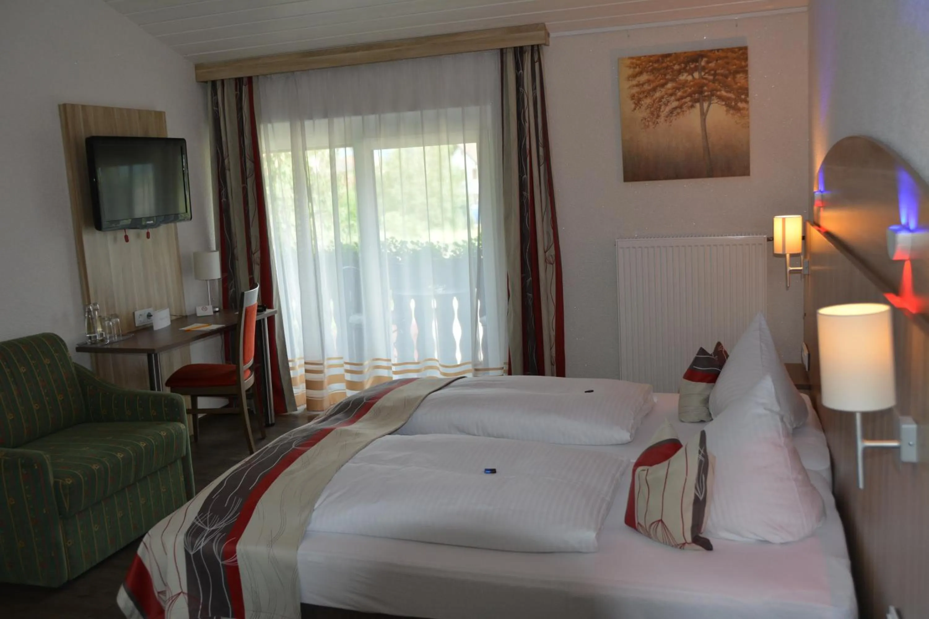 Photo of the whole room, Bed in Alpina Hotel