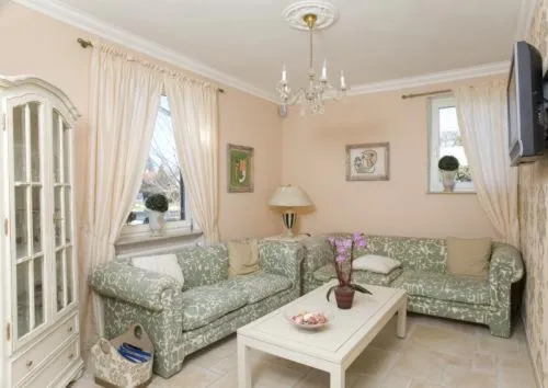 Lobby or reception in Alpina Hotel