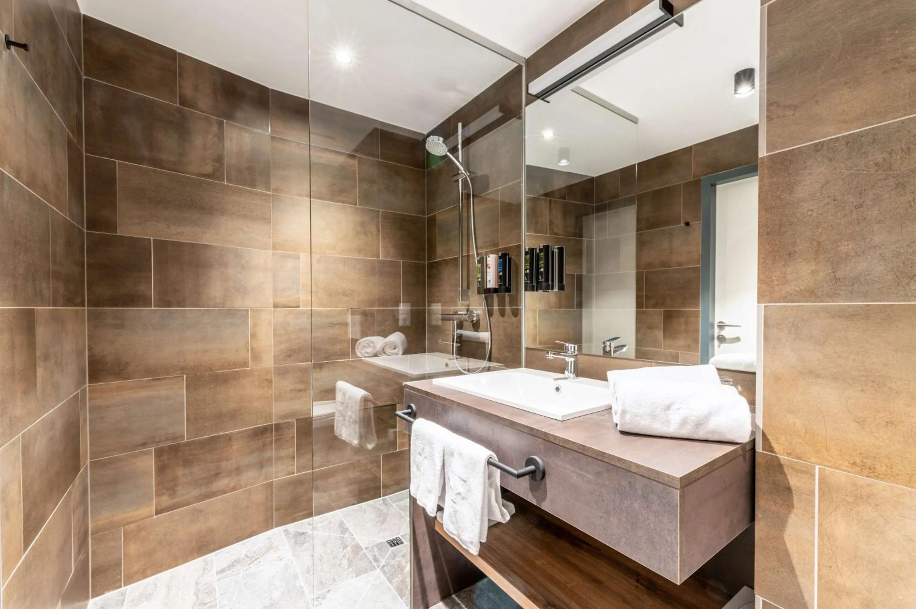 Bathroom in Aiden by Best Western Stadtgut Hotel Steyr - FREE PARKING