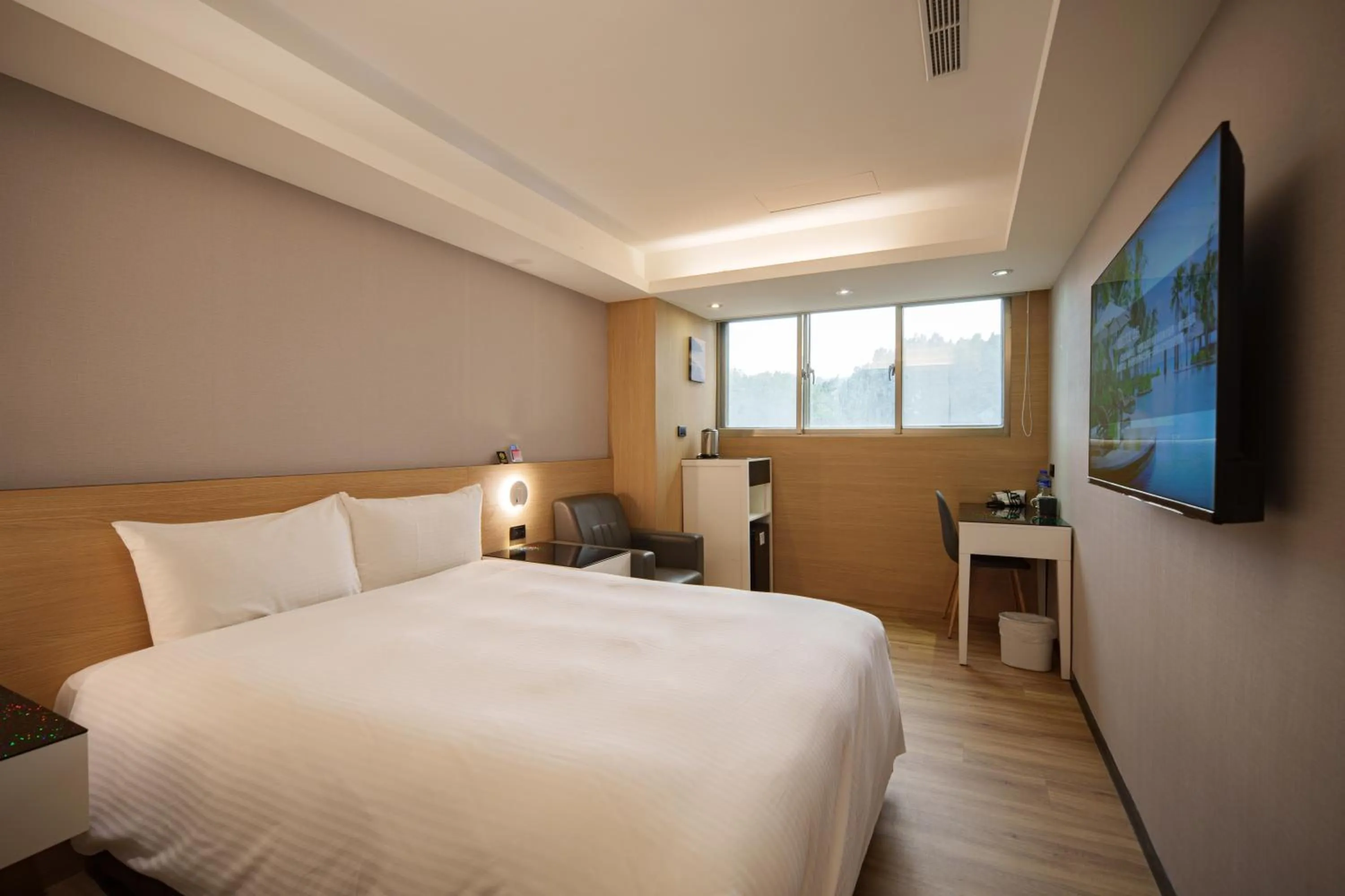Bed in HUB HOTEL Tucheng