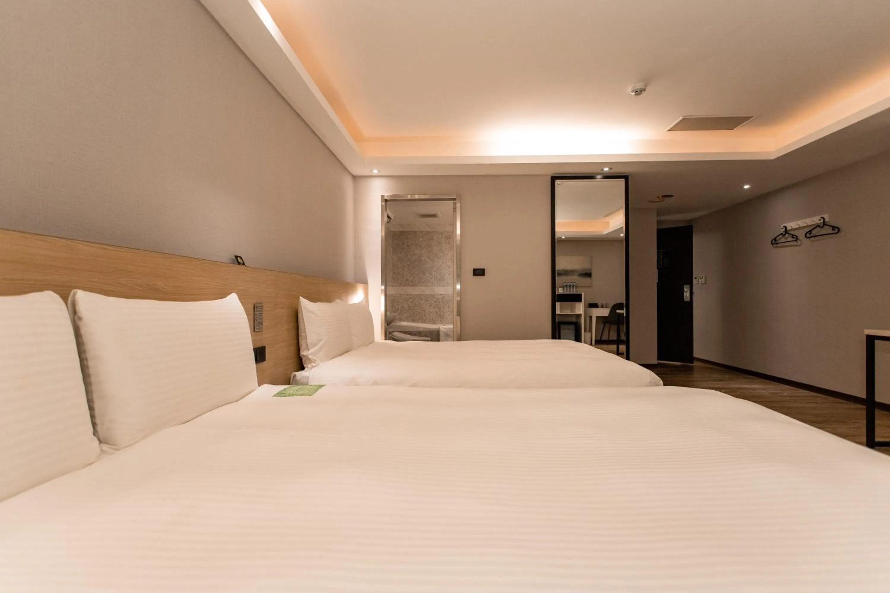 Bed in HUB HOTEL Tucheng