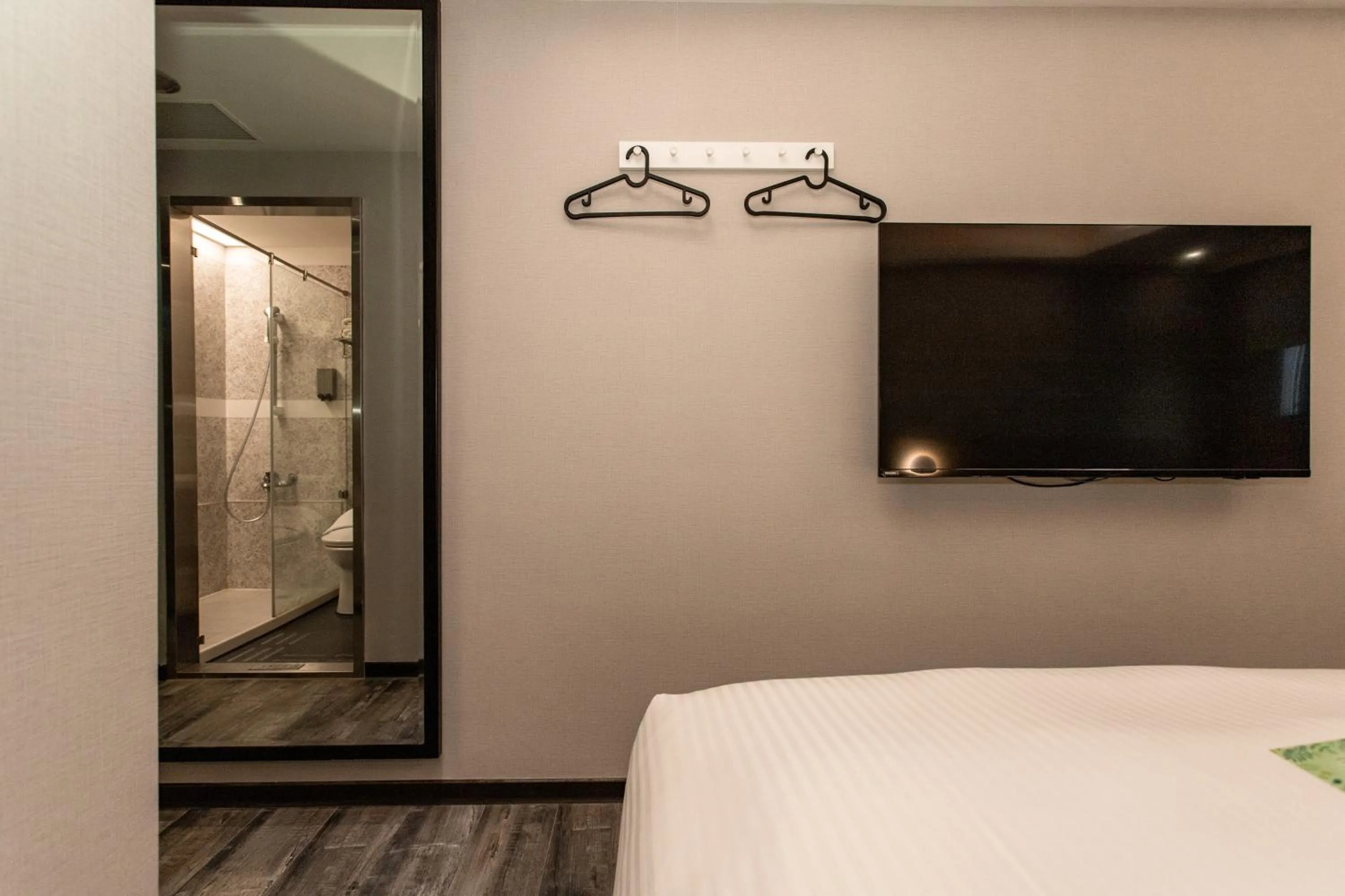 Bed in HUB HOTEL Tucheng