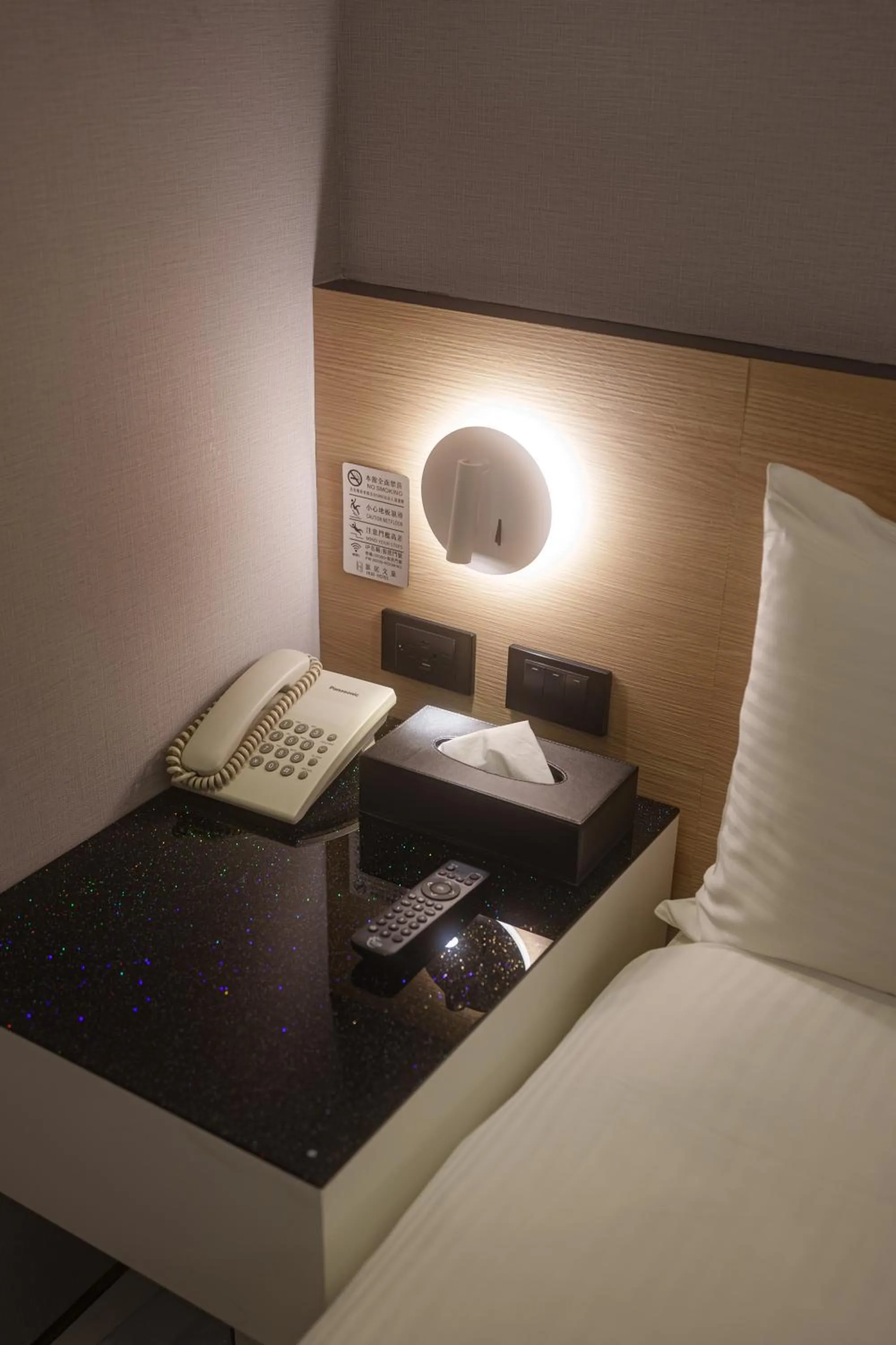 Bed in HUB HOTEL Tucheng