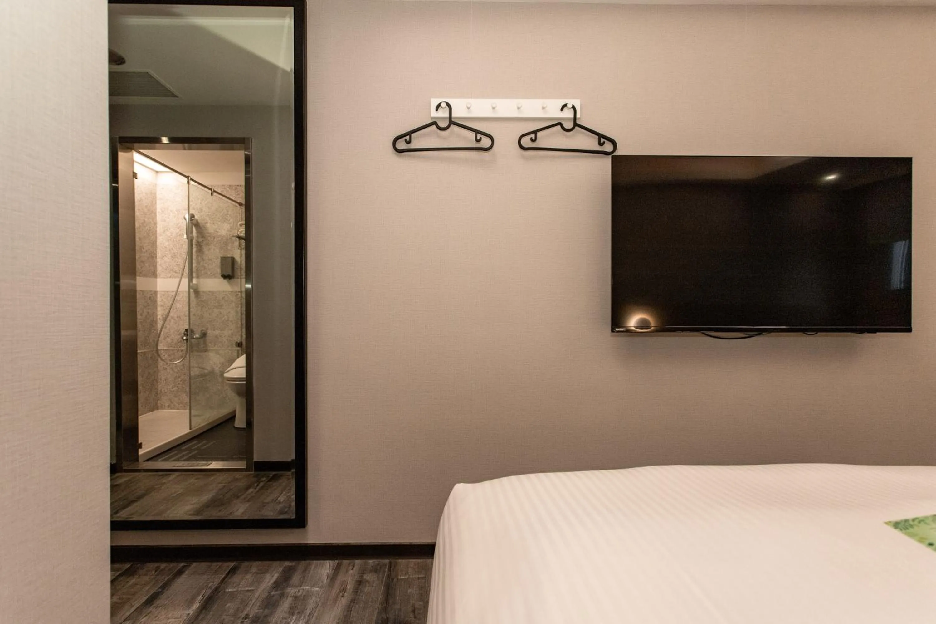 Bed in HUB HOTEL Tucheng