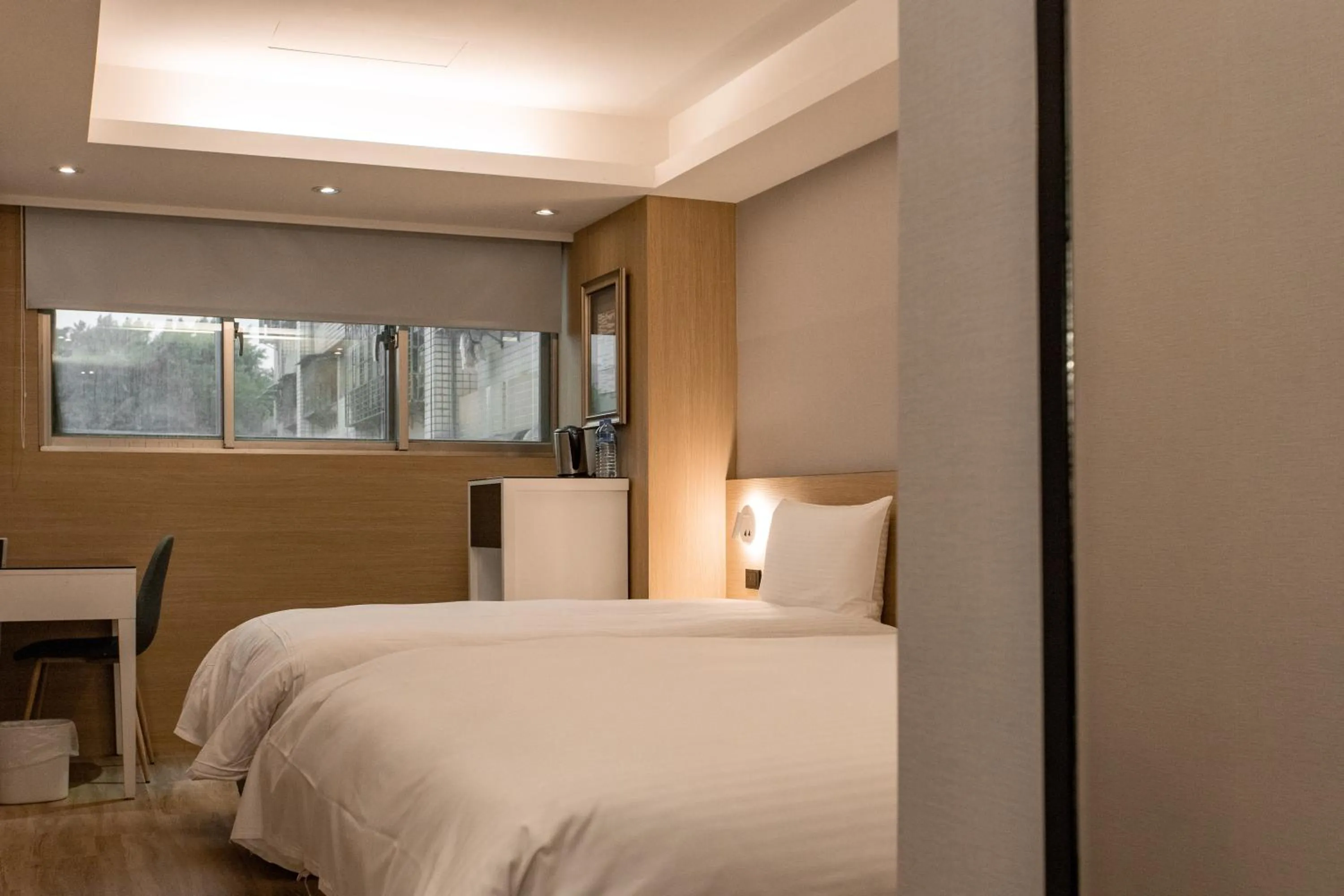 Bed in HUB HOTEL Tucheng