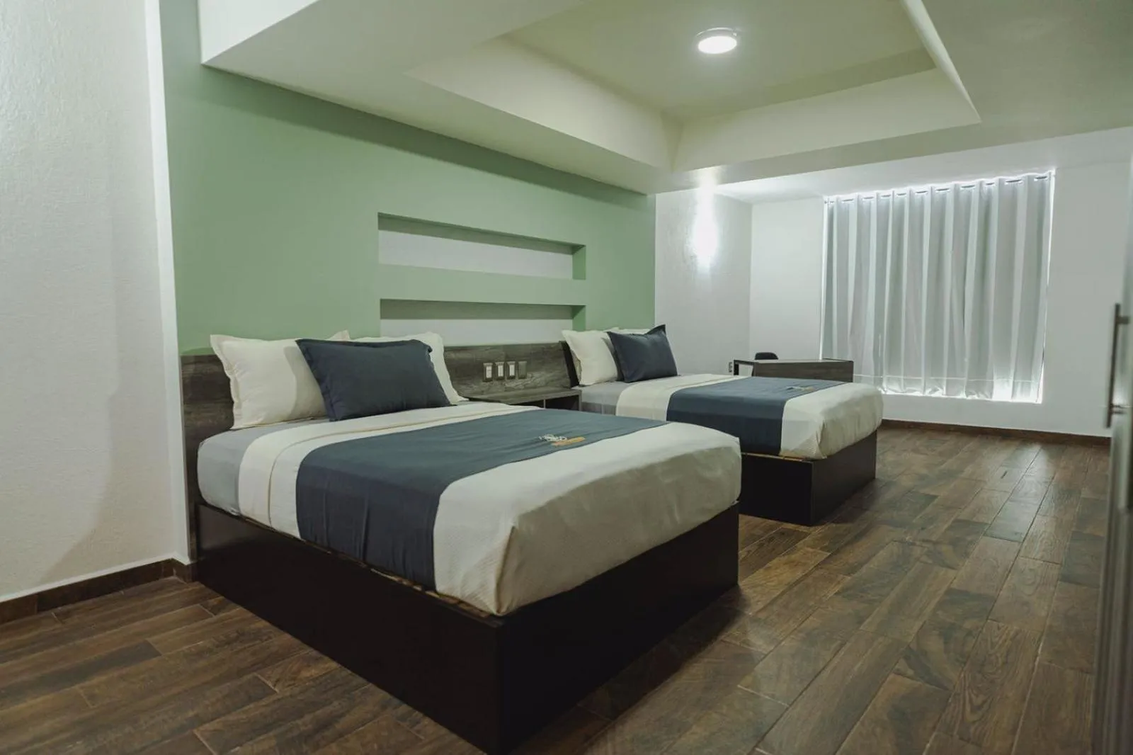 Photo of the whole room, Bed in Real Naviero Hotel Ejecutivo