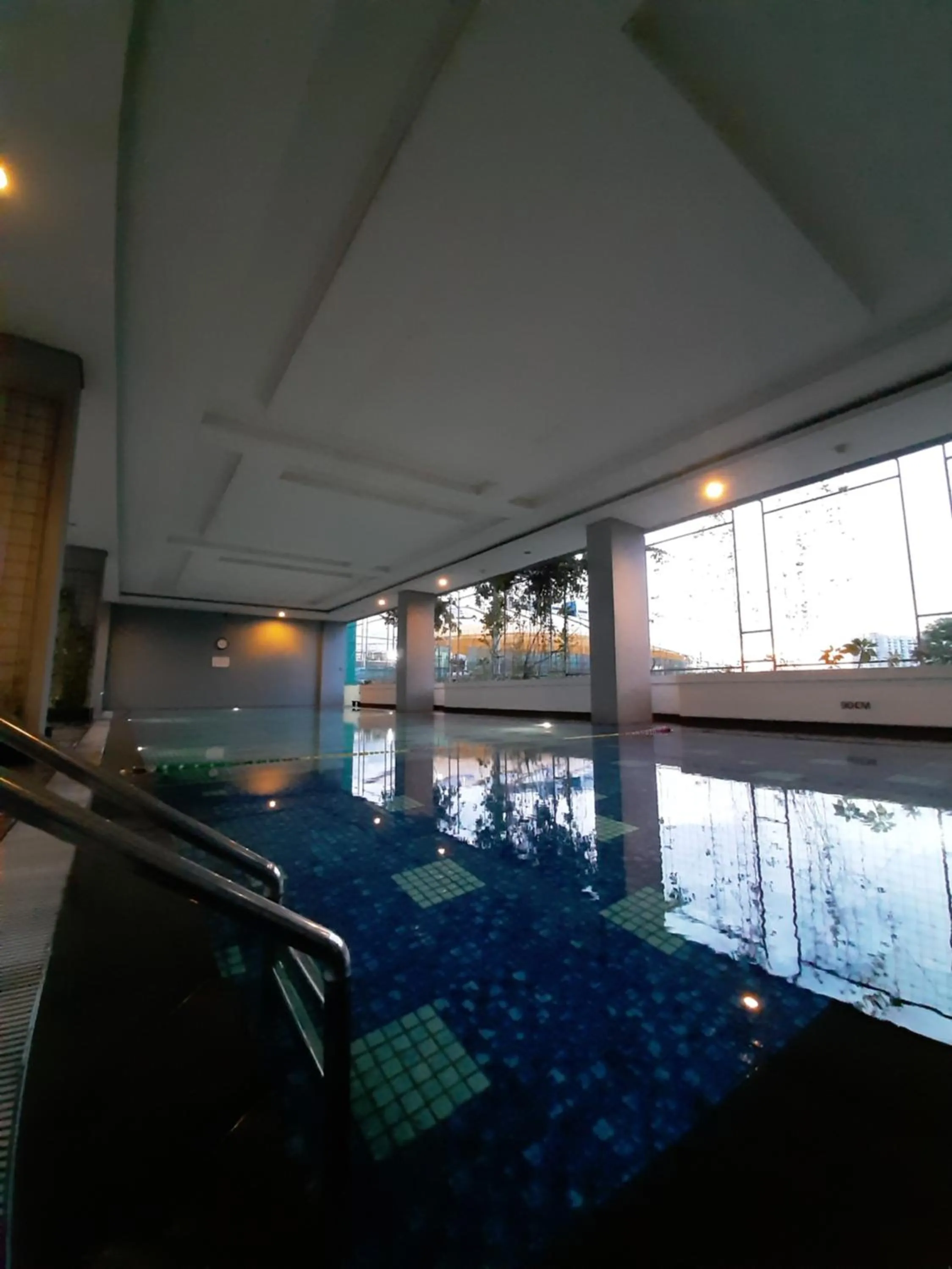 Swimming pool in Cozy The H Residence Cawang by Bonzela Property