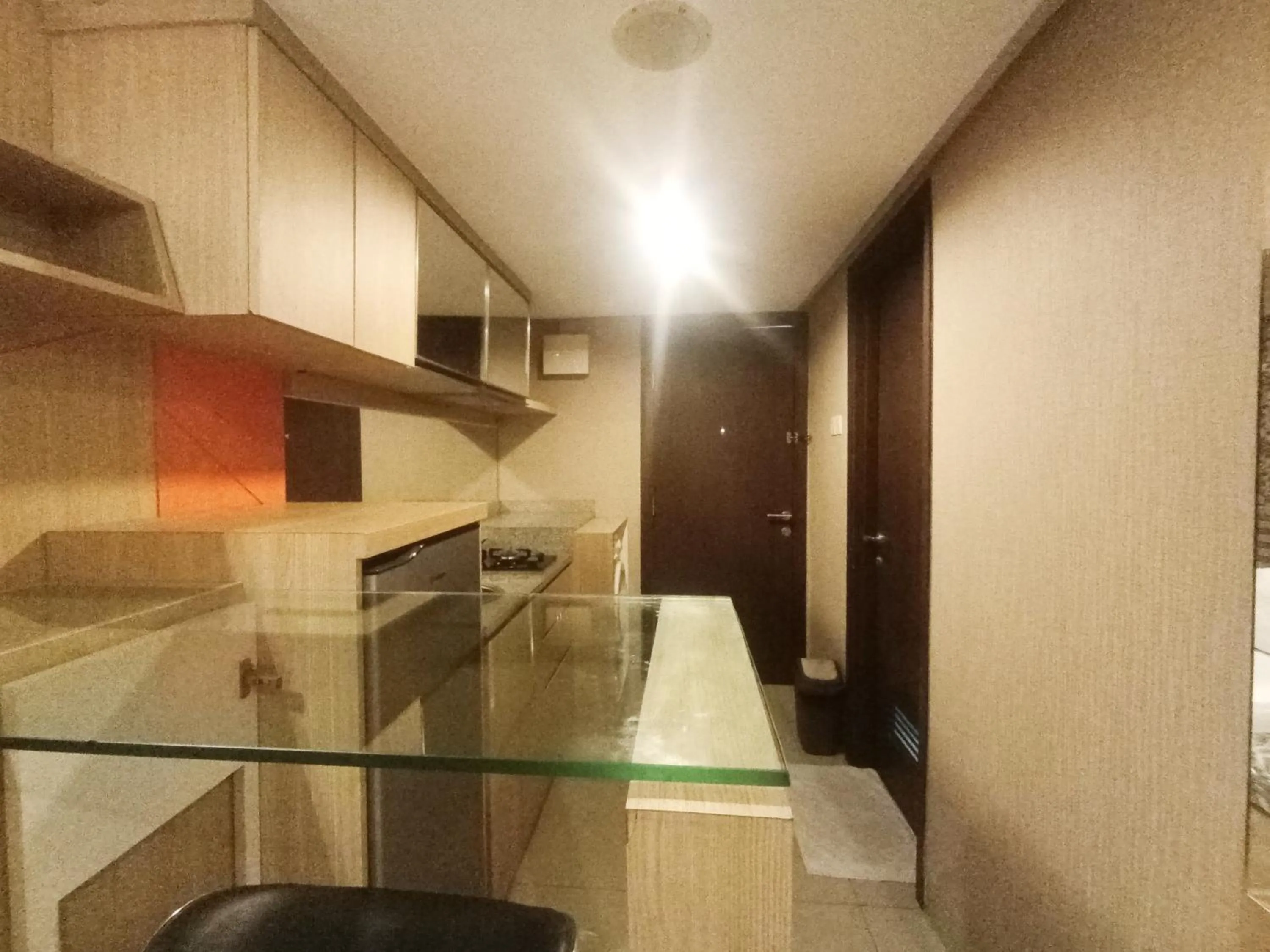 Kitchen or kitchenette in Cozy The H Residence Cawang by Bonzela Property