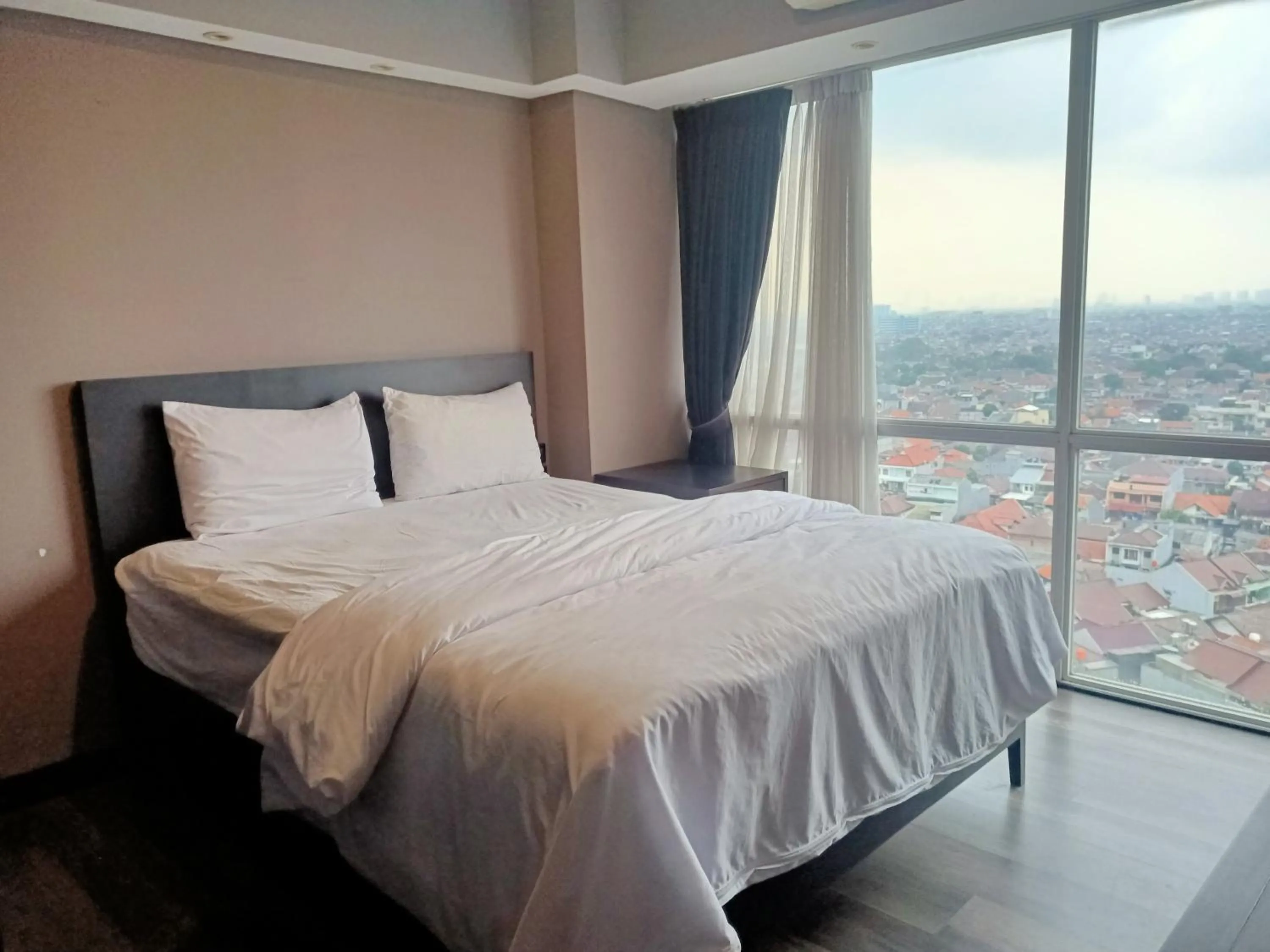 Bed in Cozy The H Residence Cawang by Bonzela Property