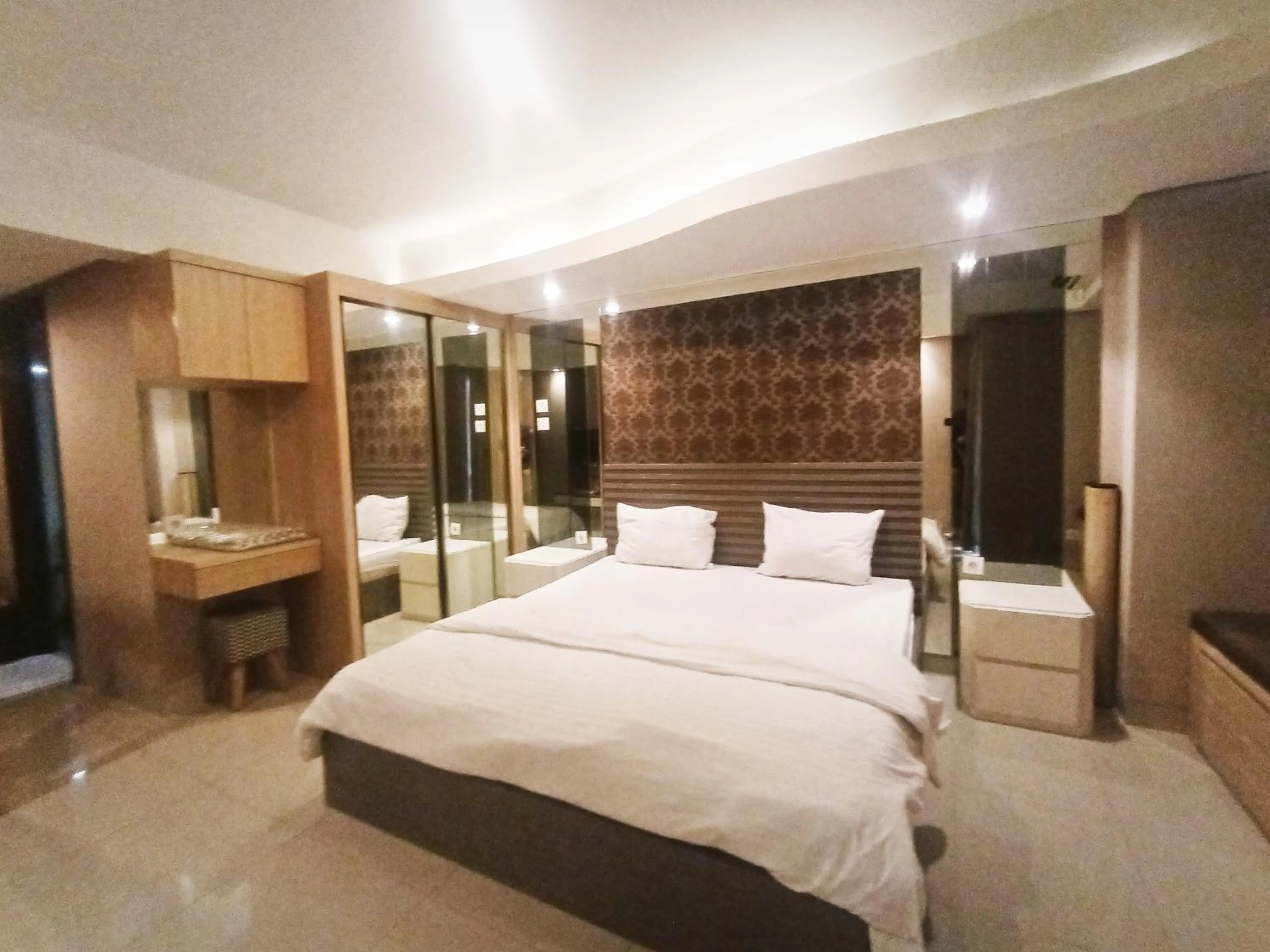 Bed in Cozy The H Residence Cawang by Bonzela Property