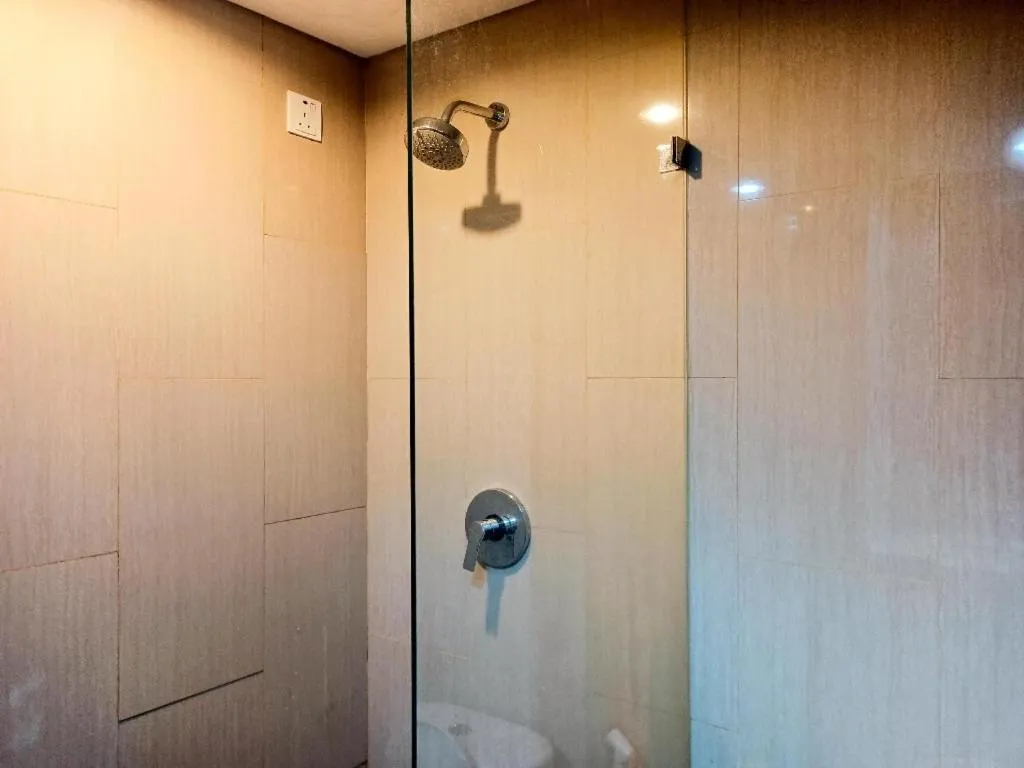 Bathroom in Cozy The H Residence Cawang by Bonzela Property