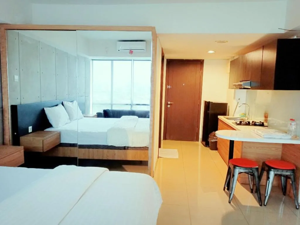 Photo of the whole room, Bed in Cozy The H Residence Cawang by Bonzela Property