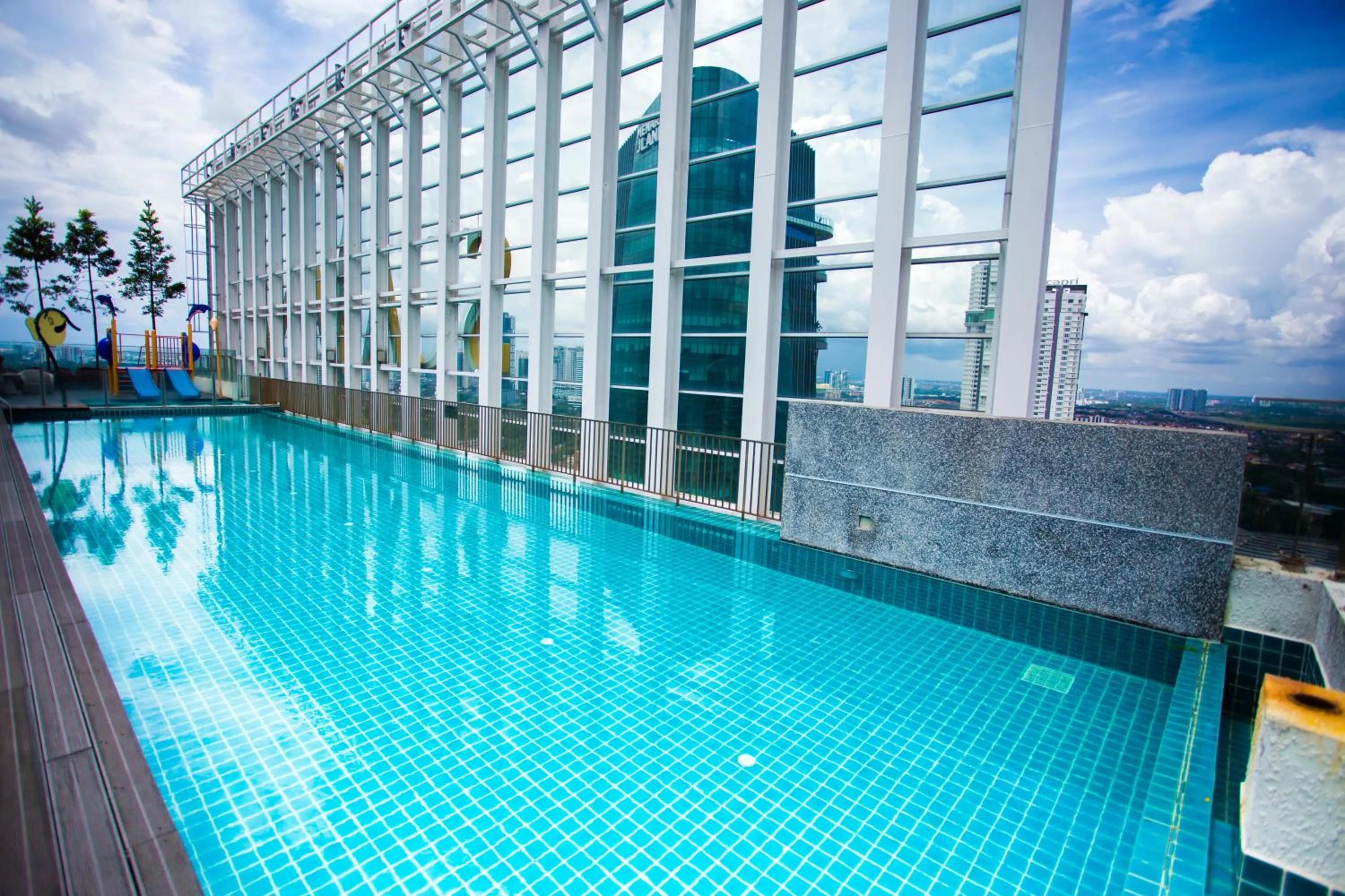 Swimming pool in Suasana suites By The one