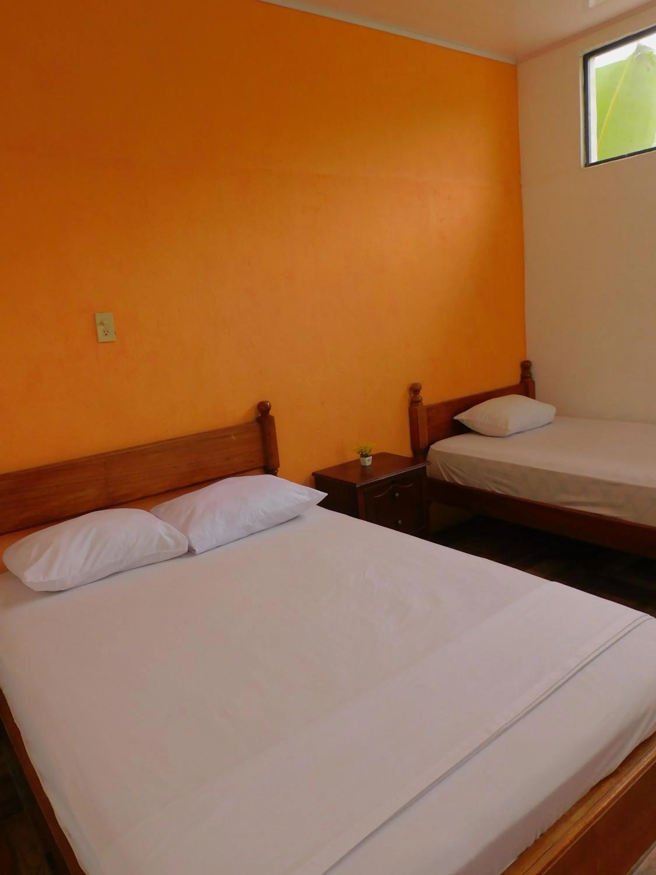Bed in Puerto Quito Lodge