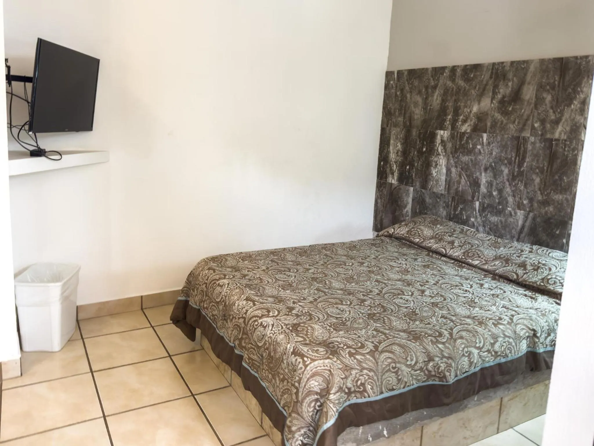 Bed in Eco Bay Hotel