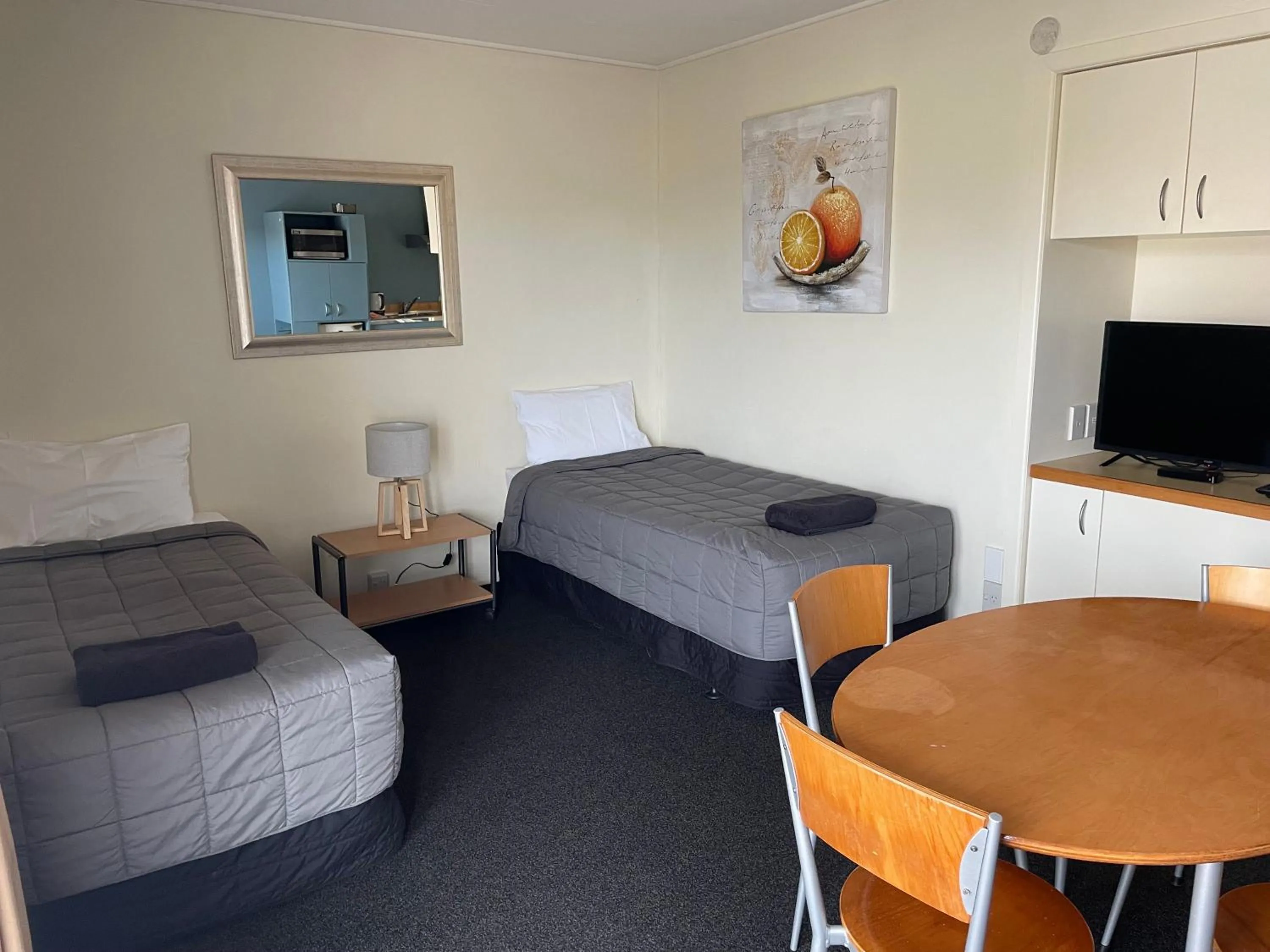 Bed in Bella Tuscany Motor Lodge