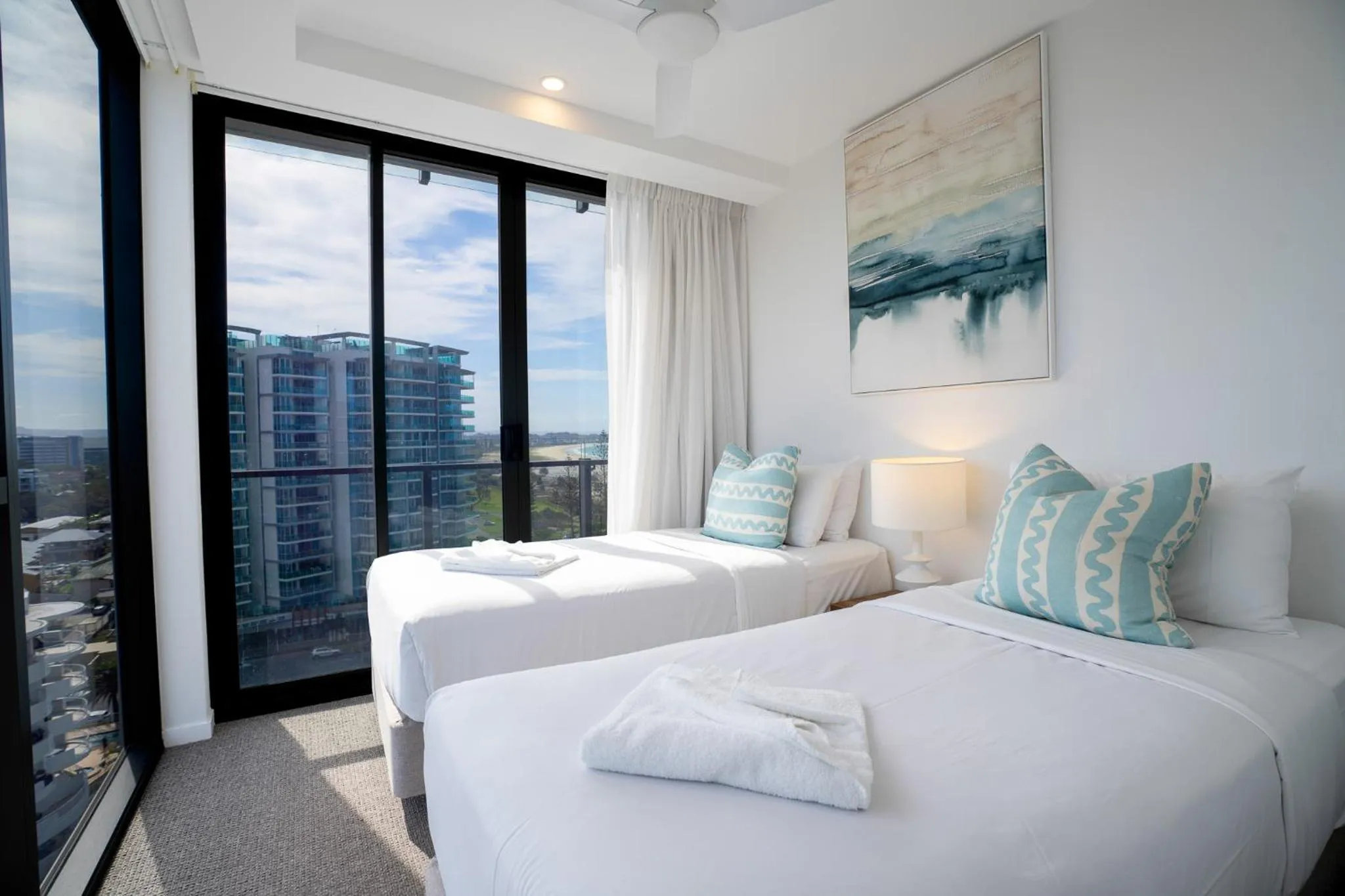 Bed in X Kirra Apartments