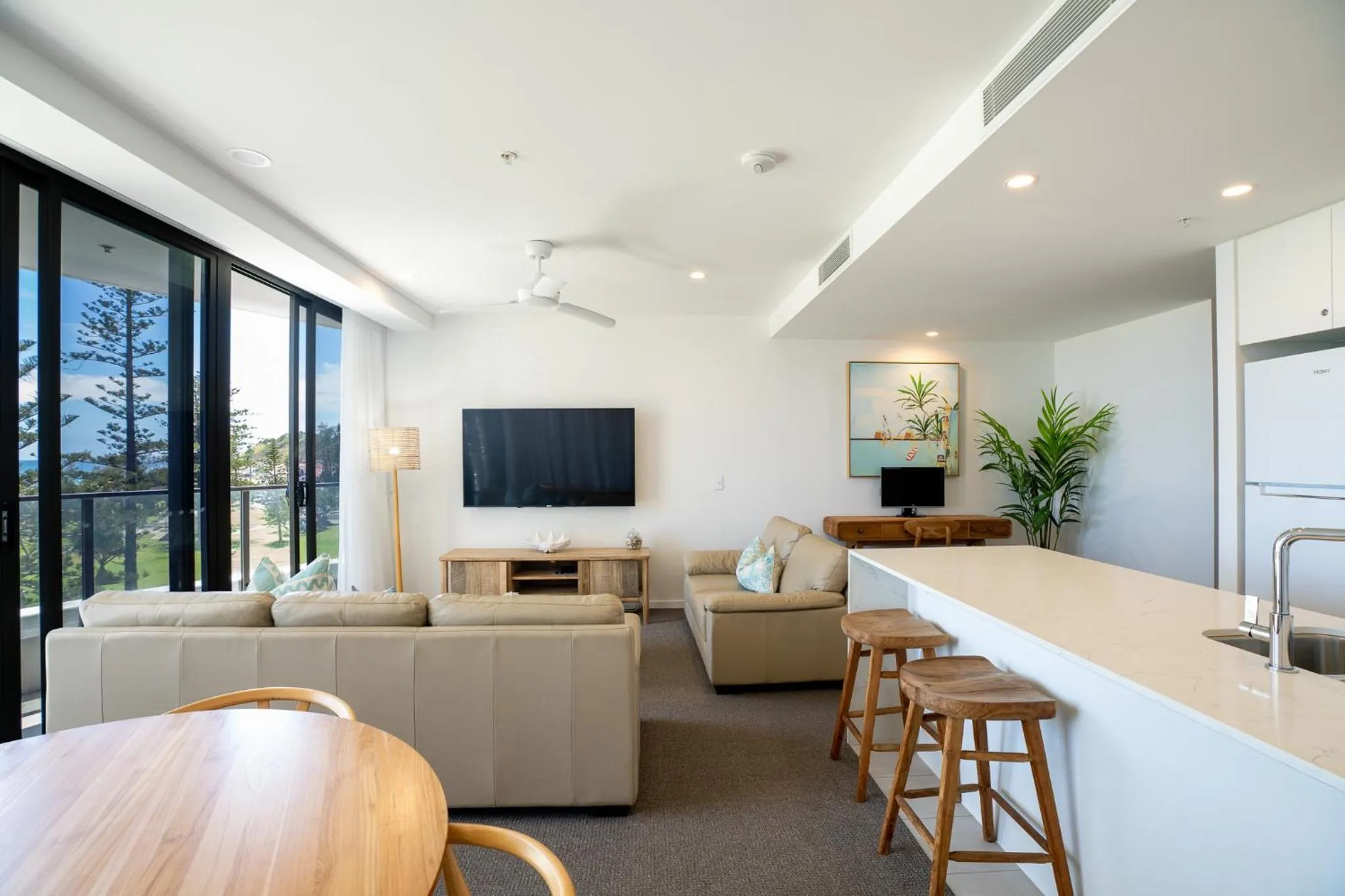 TV and multimedia in X Kirra Apartments