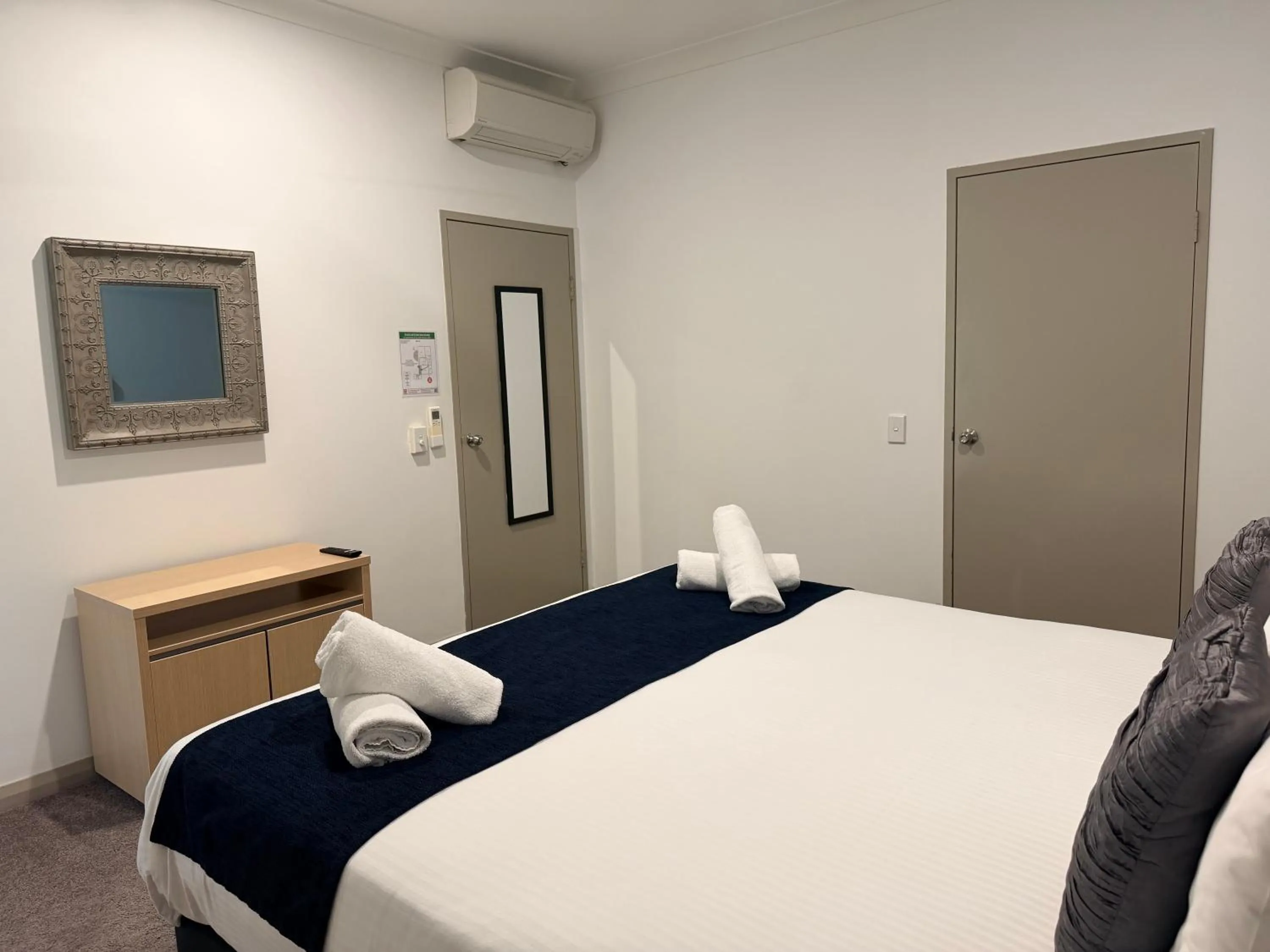 Bed in Korora Bay Village Resort