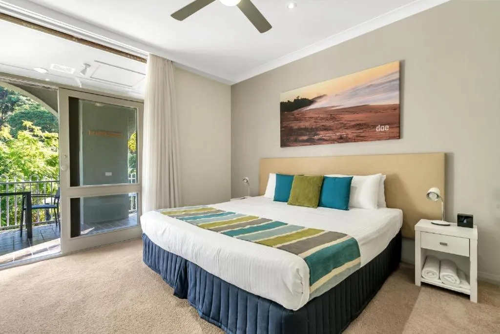 Photo of the whole room, Bed in Korora Bay Village Resort
