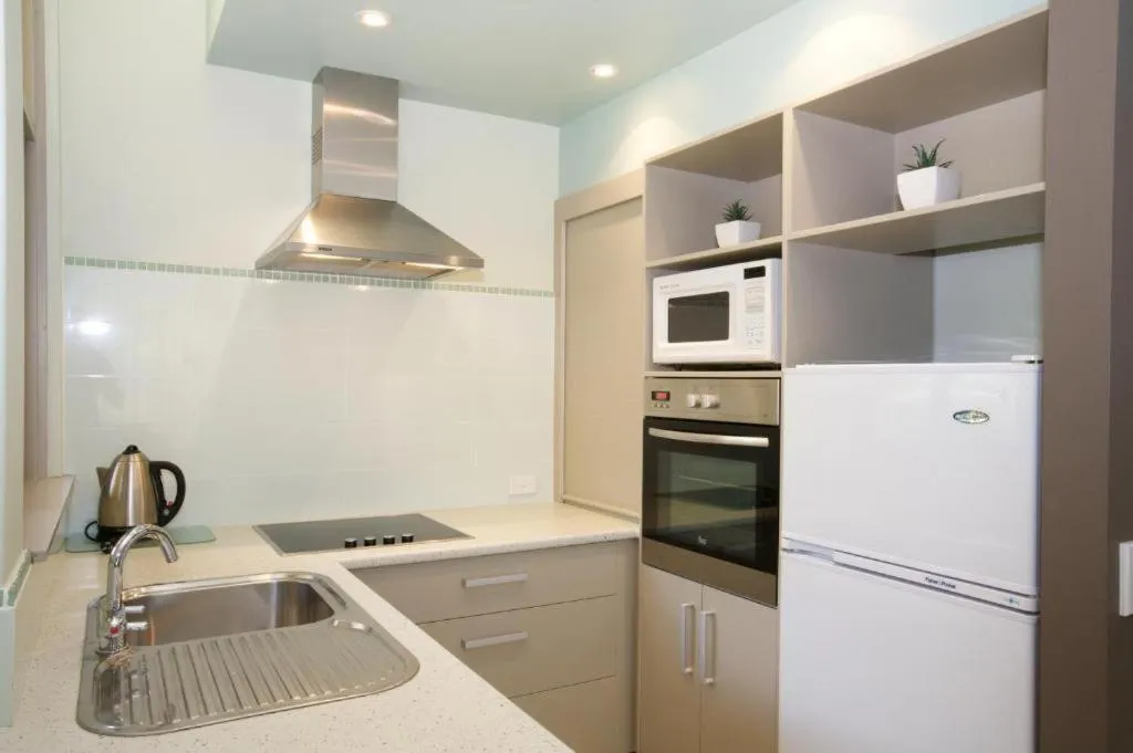 Kitchen or kitchenette in Korora Bay Village Resort