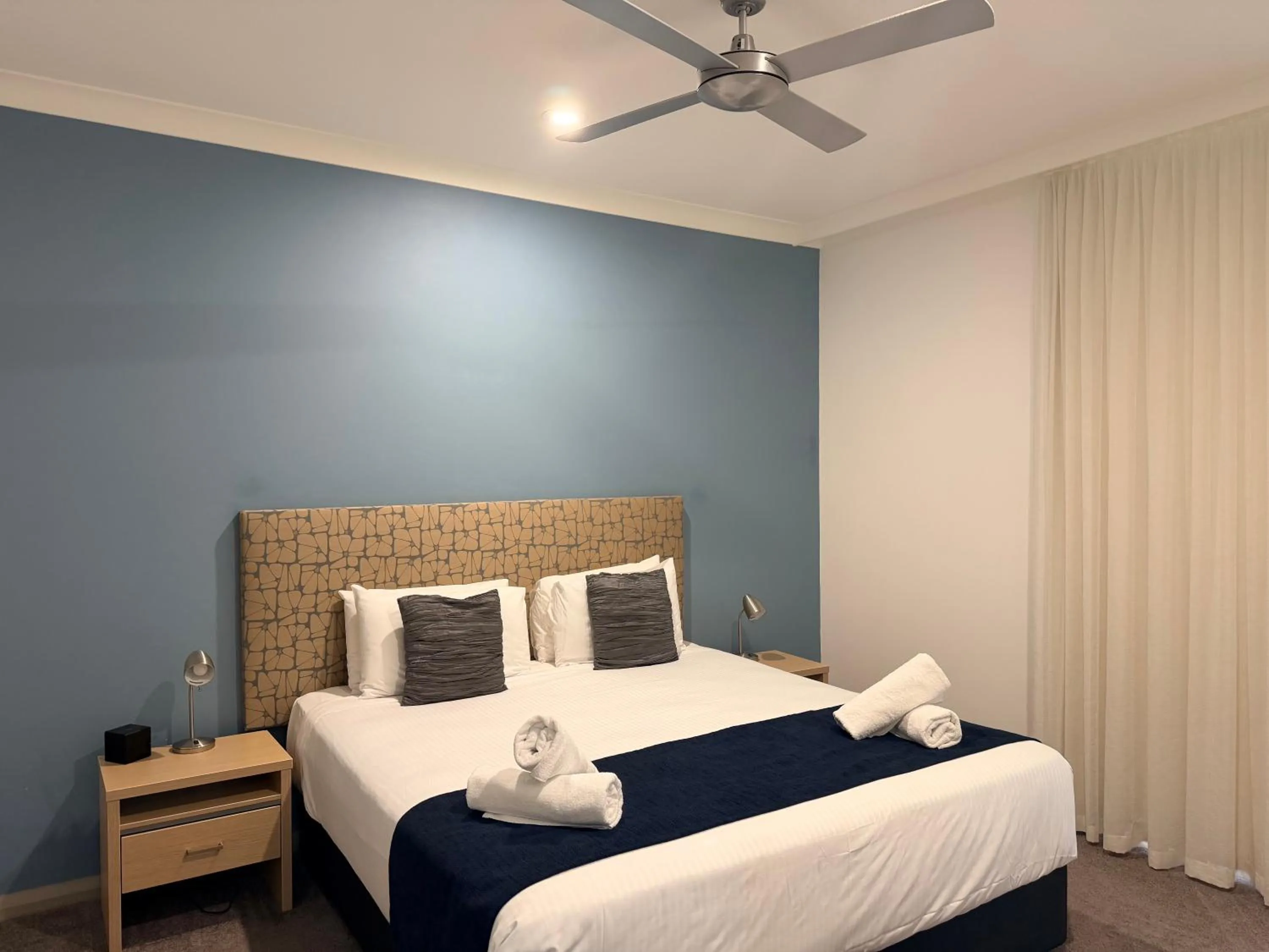 Bed in Korora Bay Village Resort