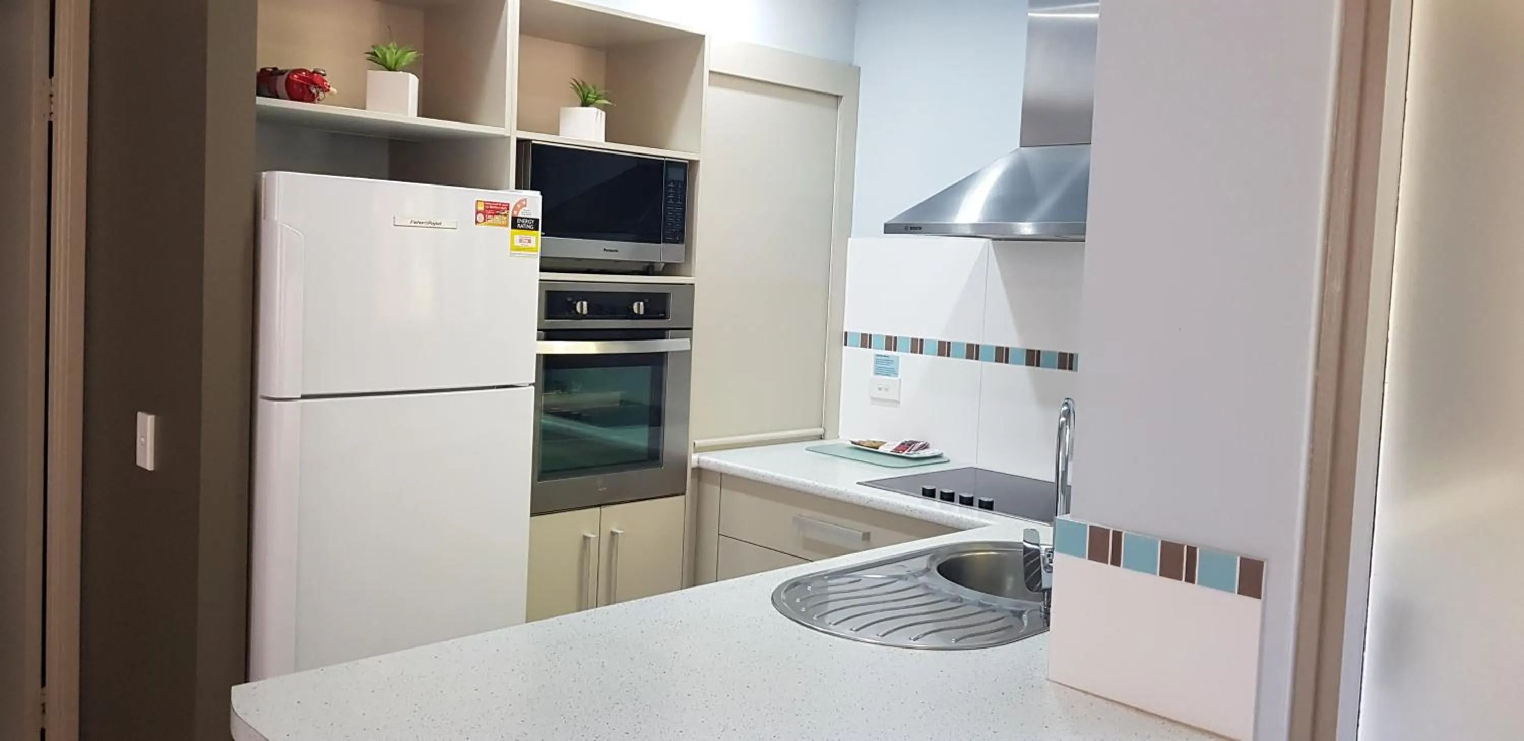 Kitchen or kitchenette in Korora Bay Village Resort
