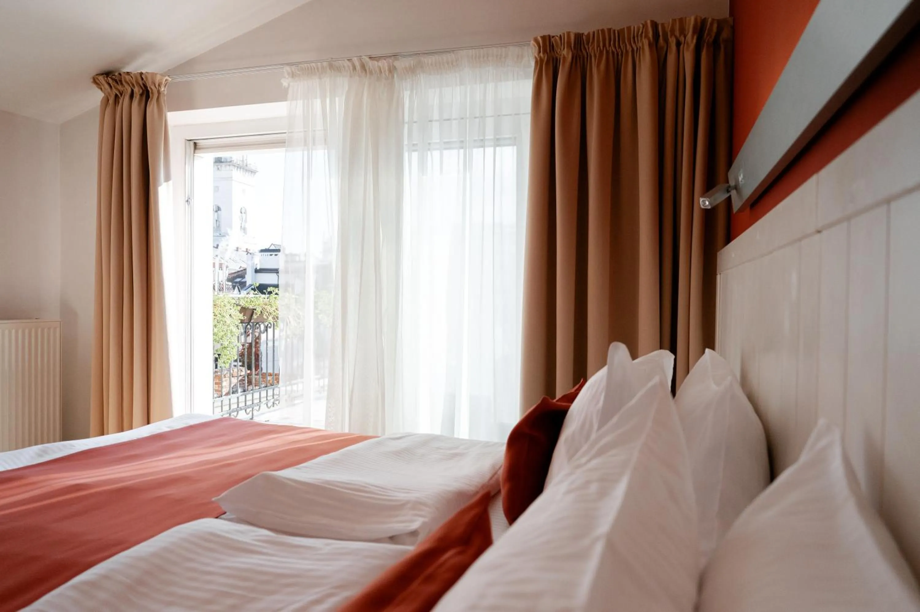 Bed in Rudolfo Hotel