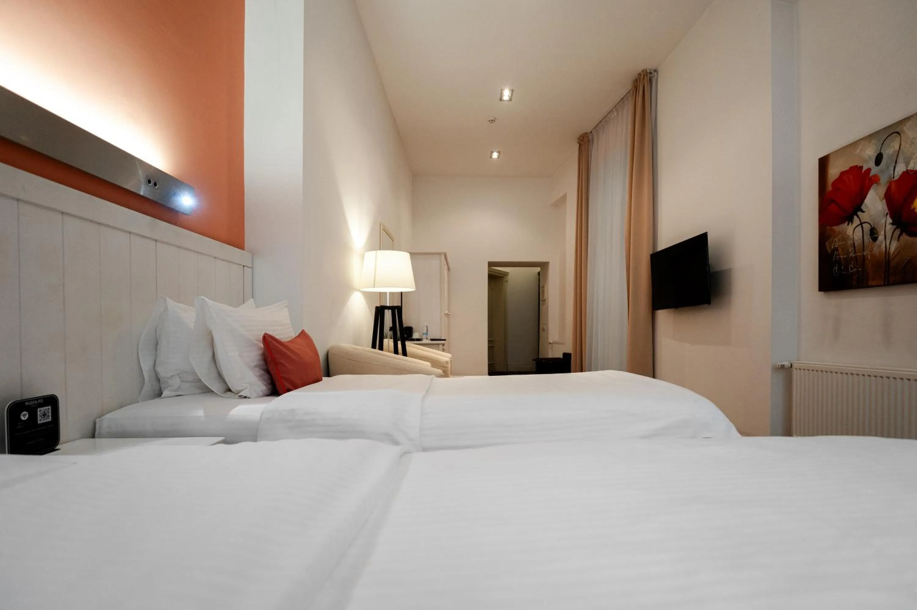 Bed in Rudolfo Hotel